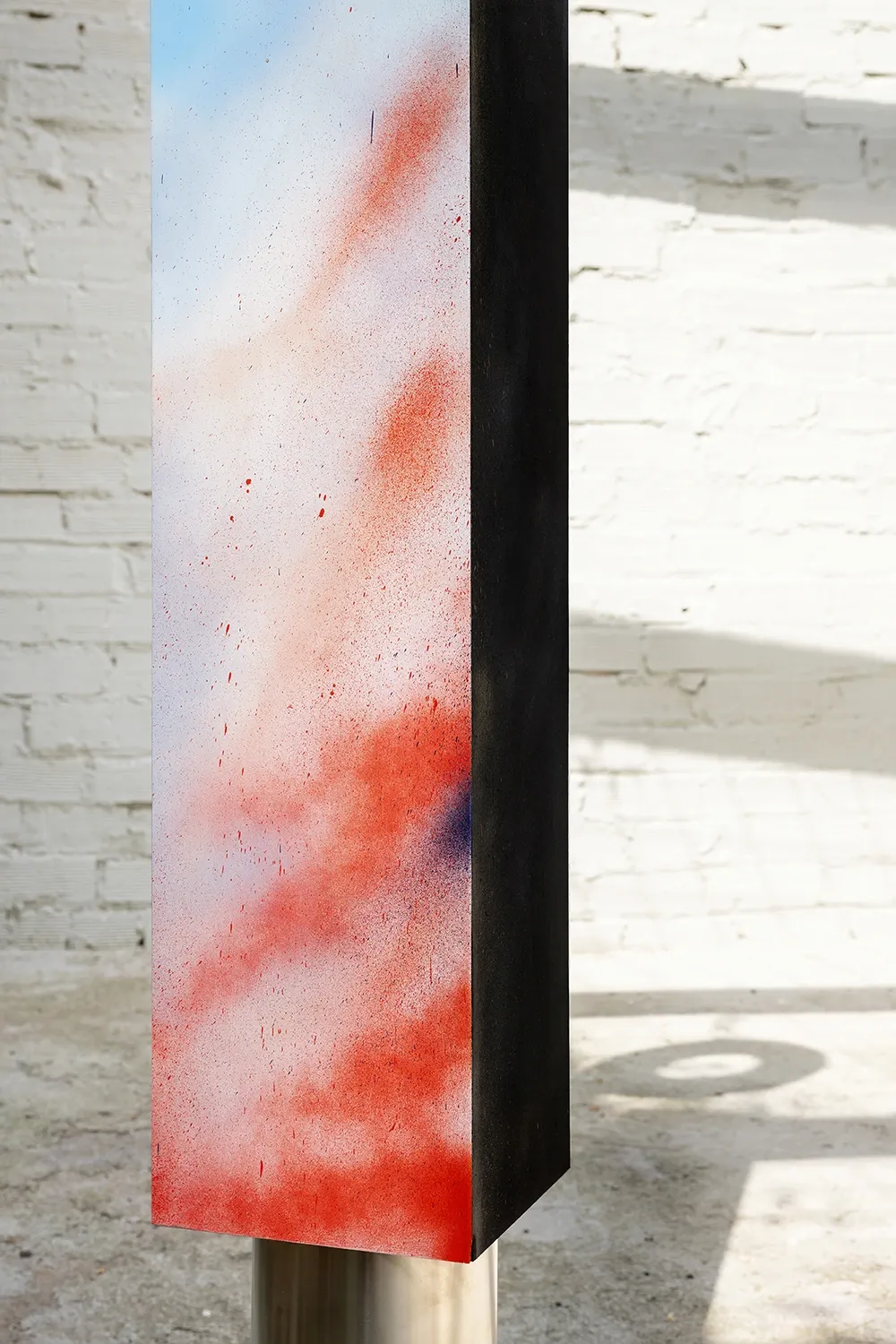 Exhibition review of Leah Dixon: Tartan Tartana at Spiritvessel, Espinavessa, 2026. Close-up of a vertical enamel panel marbled in red and white.