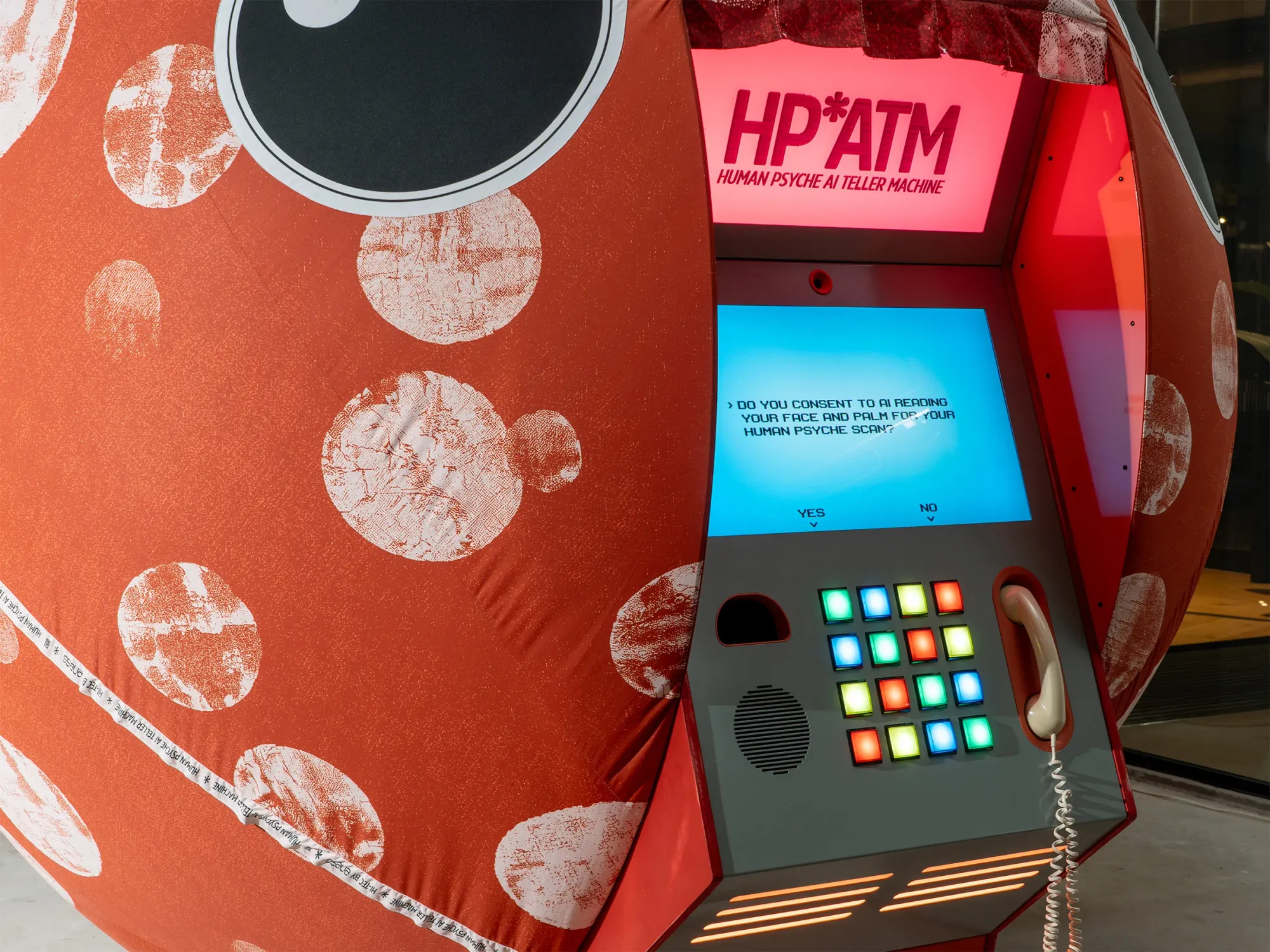 Exhibition review of Nimrod Weis: HPATM at FUTUREJUICE, Adelaide, 2026. Consent screen in red light asking to scan a visitor's face and palm.