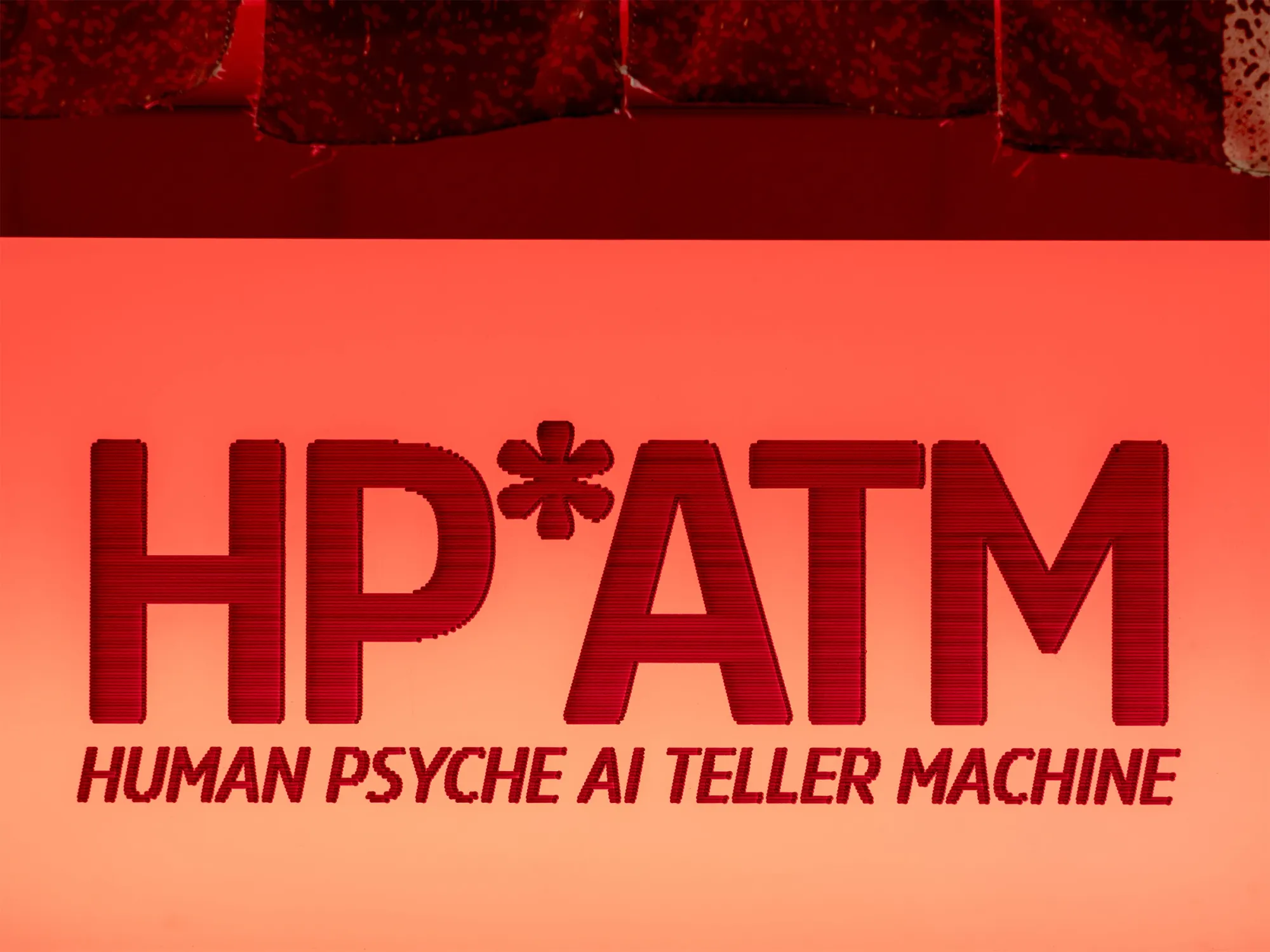 HPATM at FUTUREJUICE, Adelaide, 2026. Macro detail of the illuminated HP*ATM sign glowing red.