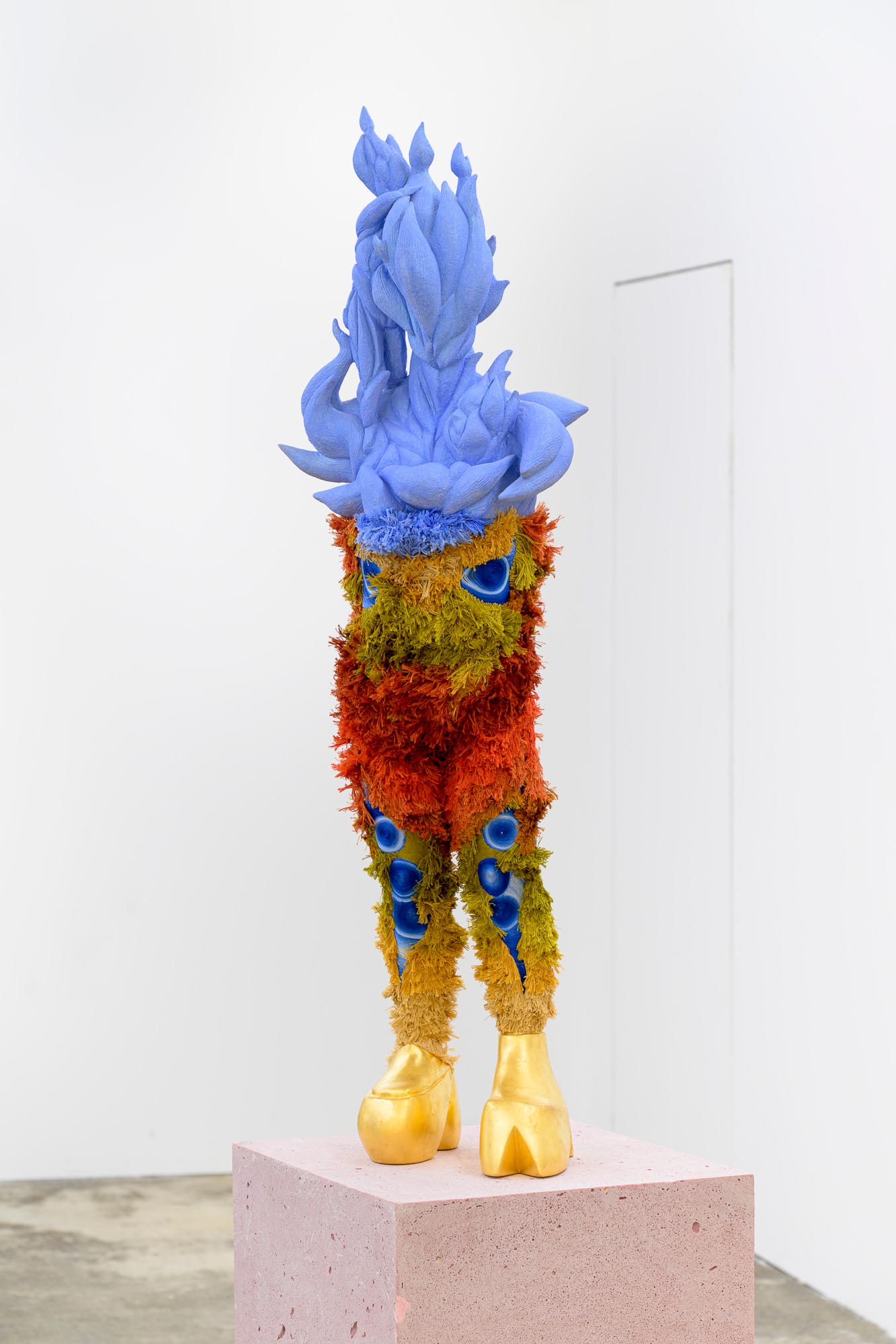 Exhibition review of Soft Power: sculpture by Magdaléna Roztočilová with pale blue fibrous mane and legs woven from moss and beads.