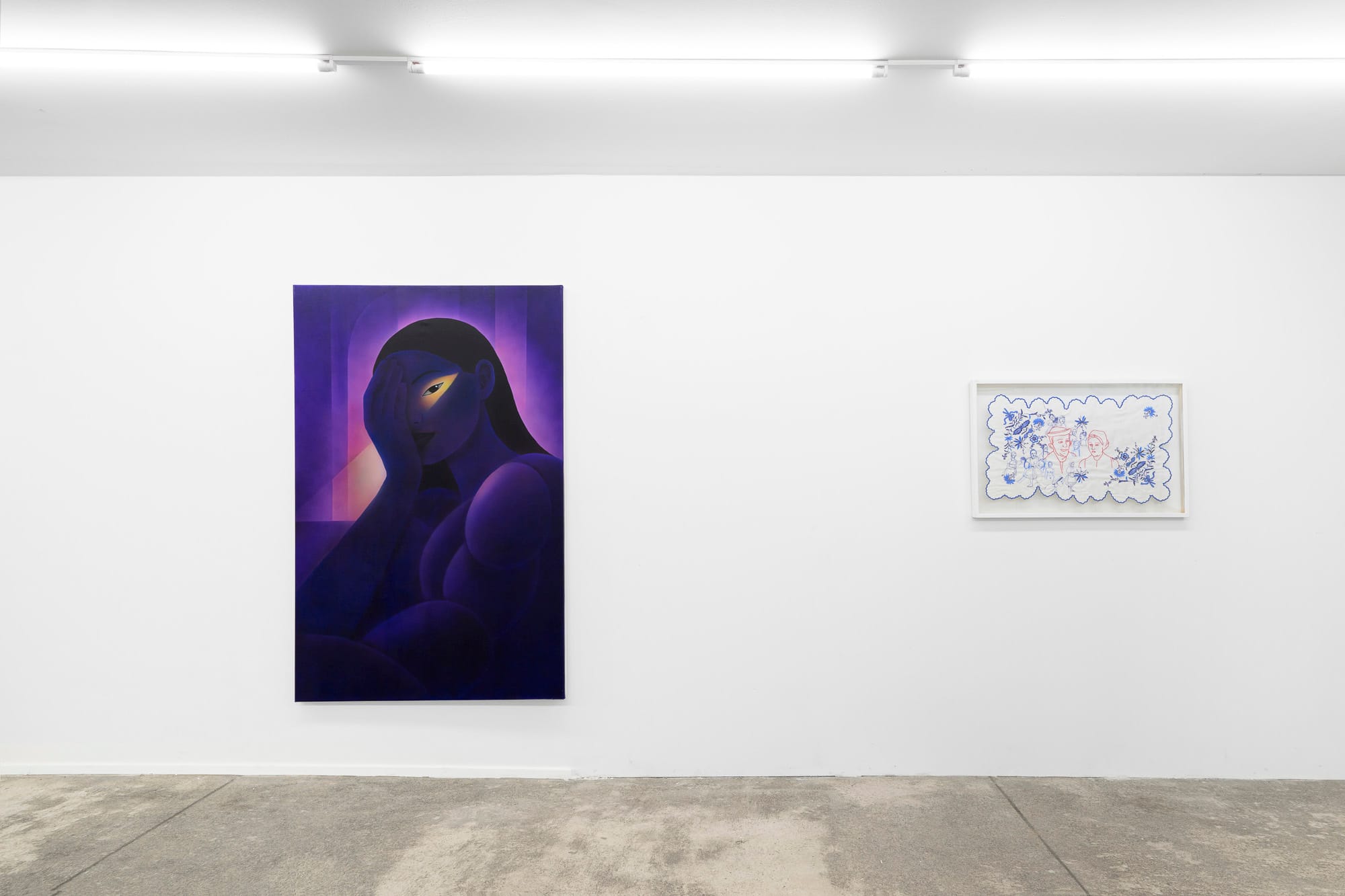 Exhibition review of Soft Power: framed embroidery by Ivana Šáteková with red and blue figures and floral border, shown beside a large painting by Aziya.