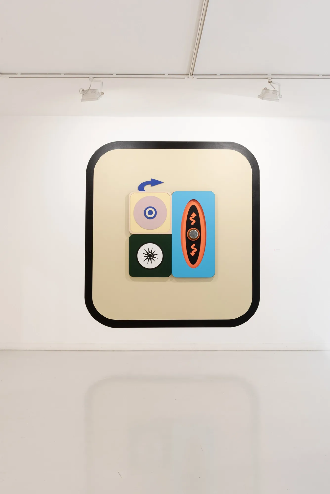 Exhibition review of Kaija Hinkula: You Are Here at Ama Gallery, Helsinki, 2026. A cream panel with an eye motif beside a blue oval holding a vintage barometer.