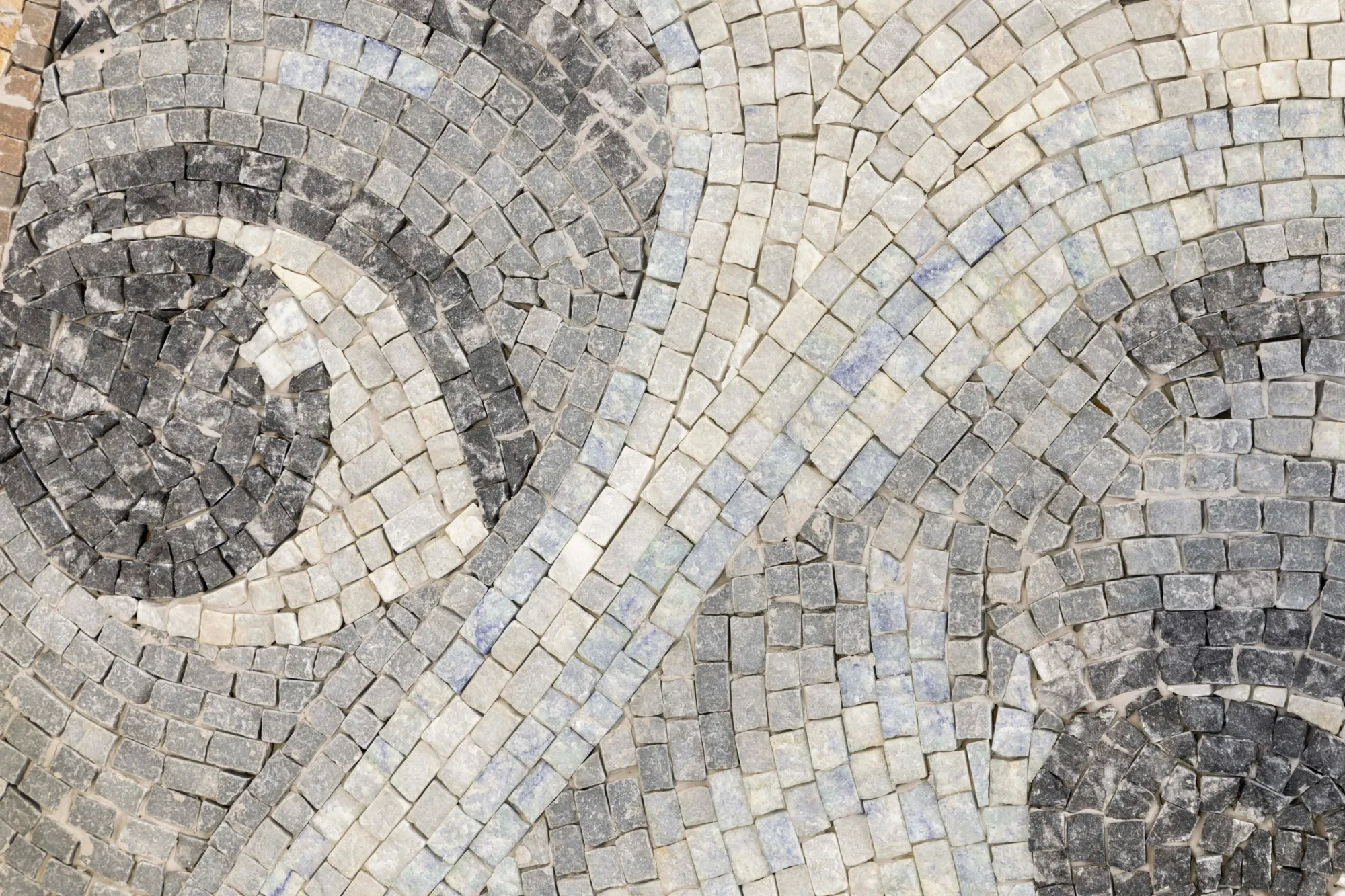 catapult contemporary - Exhibition review of Riikka Anttonen: Vertere at Sinne, Helsinki, 2026. Macro detail of hand-cut marble tesserae forming swirling grey and cream patterns.