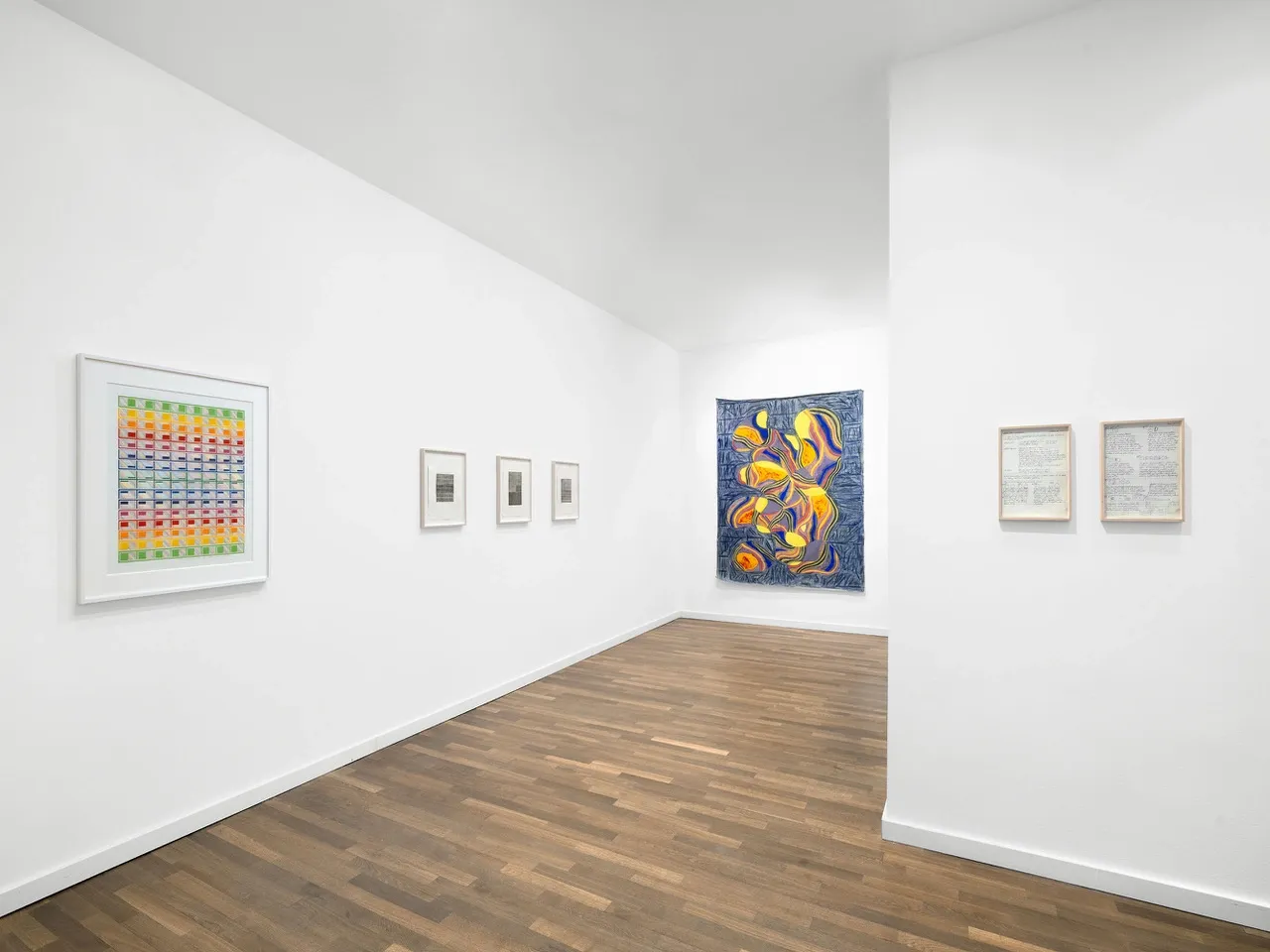 Artist Profile Feature: Sophie-Luise Passow, artwork at Crone Berlin, 2026. Blue-grey linen with yellow forms at the end of a white room.