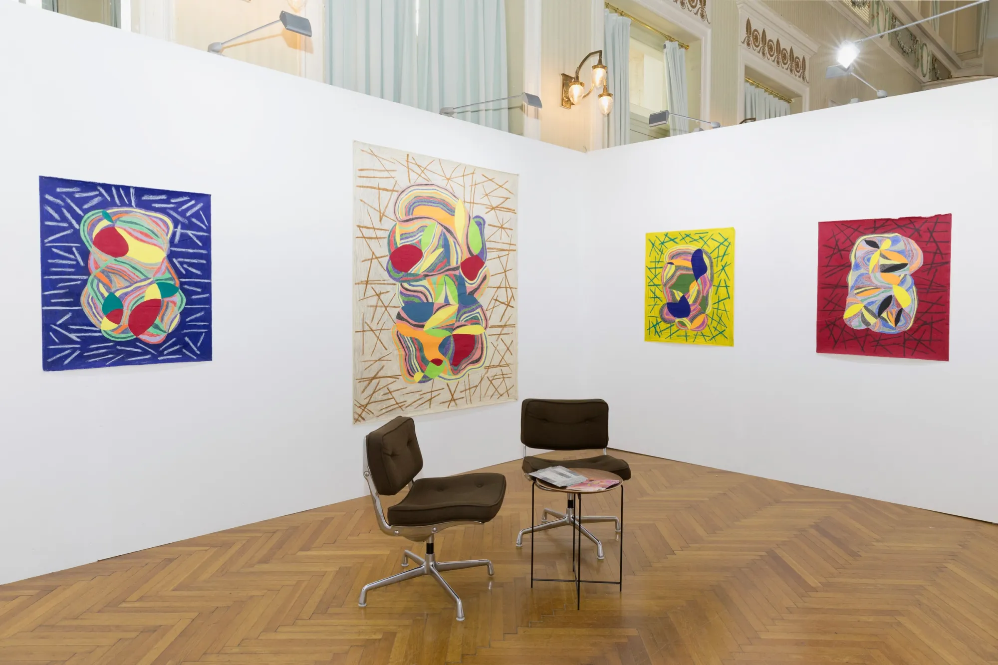 Artist Profile Feature: Sophie-Luise Passow, artwork at Parallel Vienna, 2026. Four linen works in blue, cream, yellow and red in a white booth
