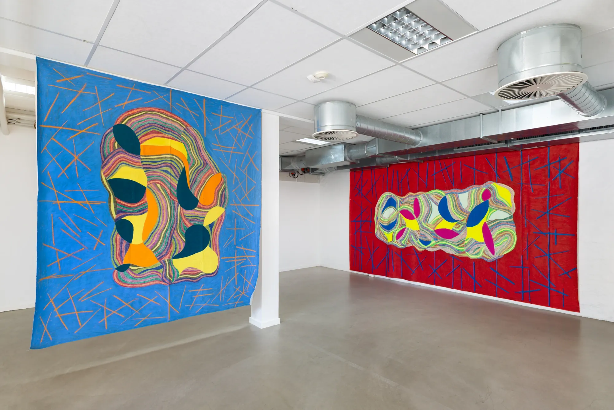Artist Profile Feature: Sophie-Luise Passow, artwork at CANTINA, Aarhus, 2026. Blue linen hung free in the room, red linen on the wall behind.