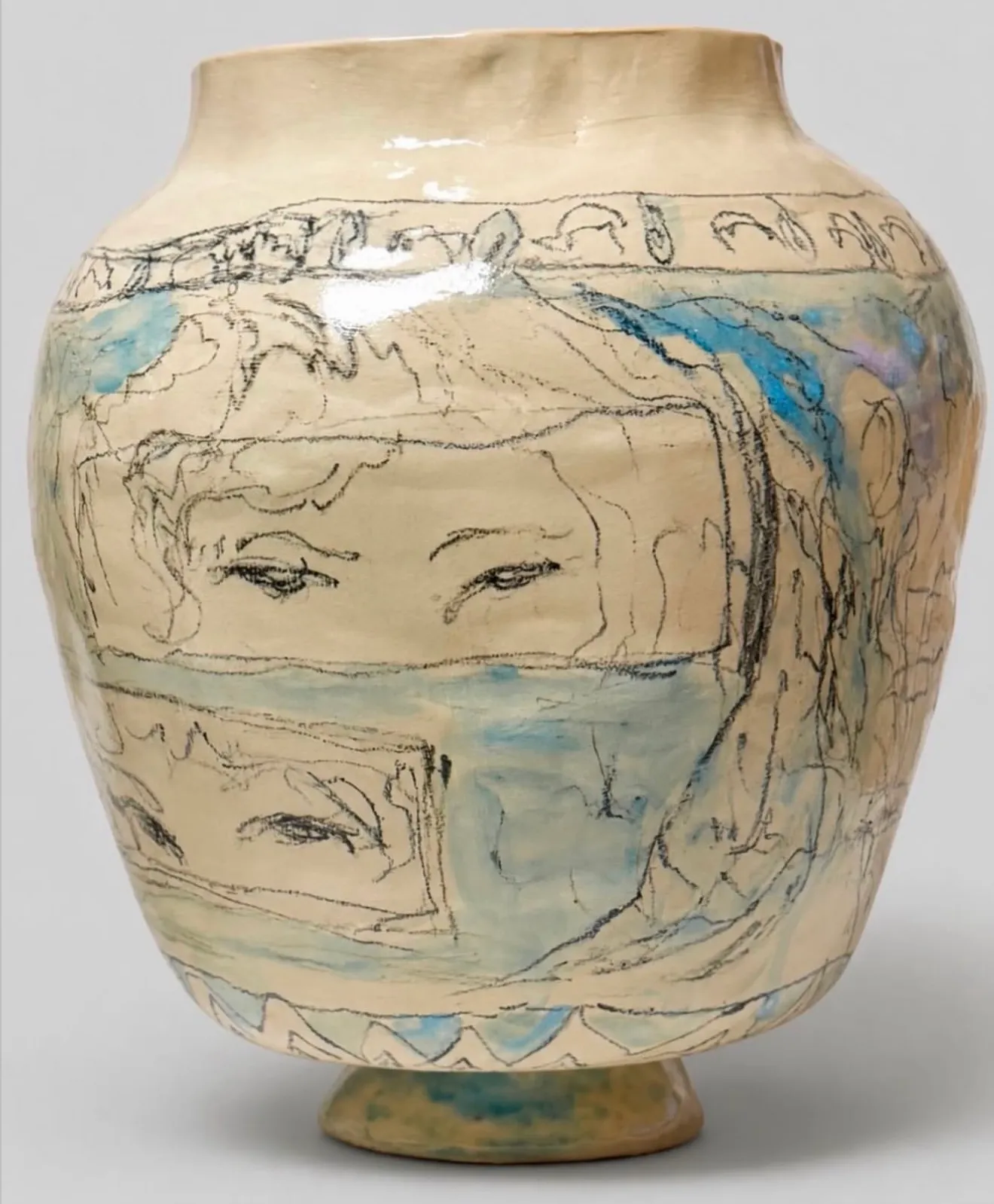 ALT: Christina Arark: ceramic vase with drawn pairs of eyes inside framed screens on a blue and cream ground.
