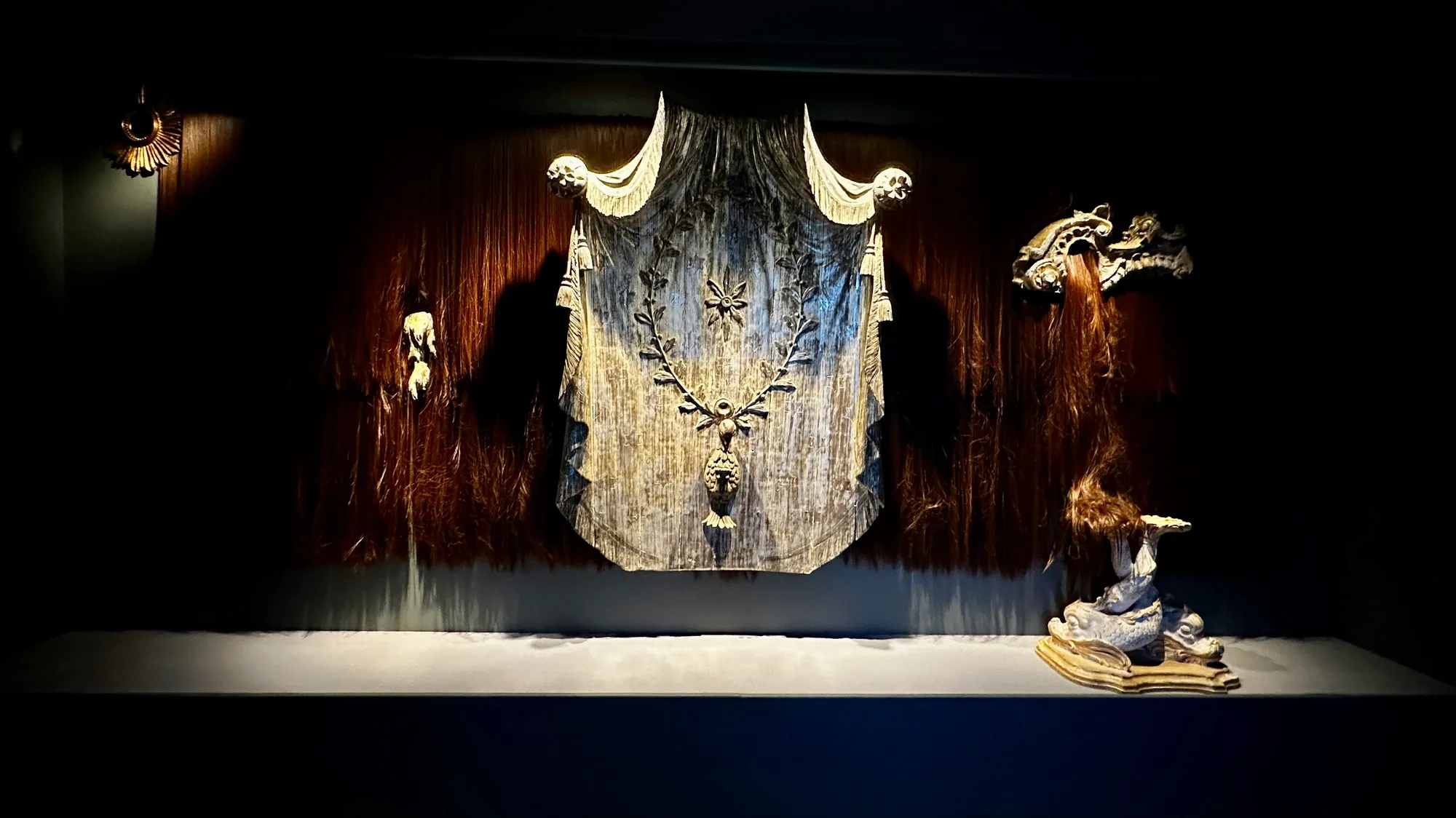 Jakob Lena Knebl’s All Seeing I, a dark textile installation with long hair-like material at the Marmorschlössl.