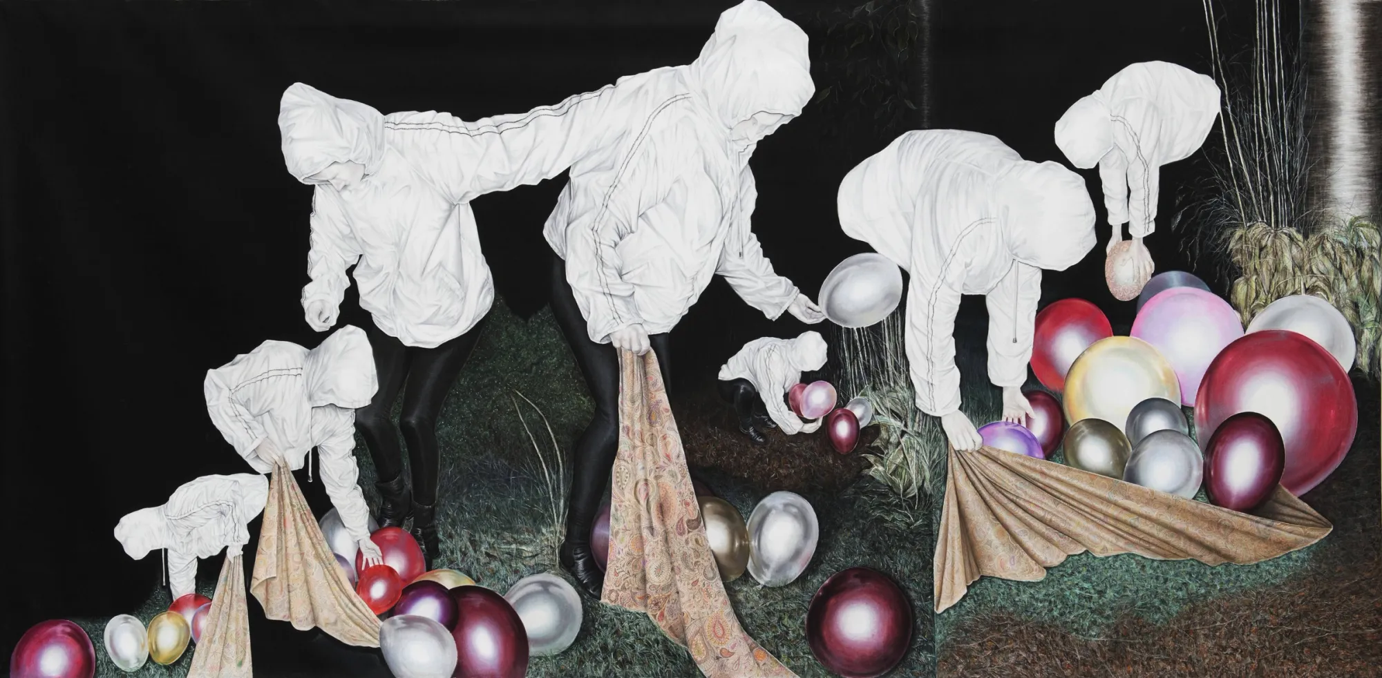 Karolína Netolická, Prague: hooded figures in white jackets drag patterned cloths full of glossy balloons across a dark lawn.
