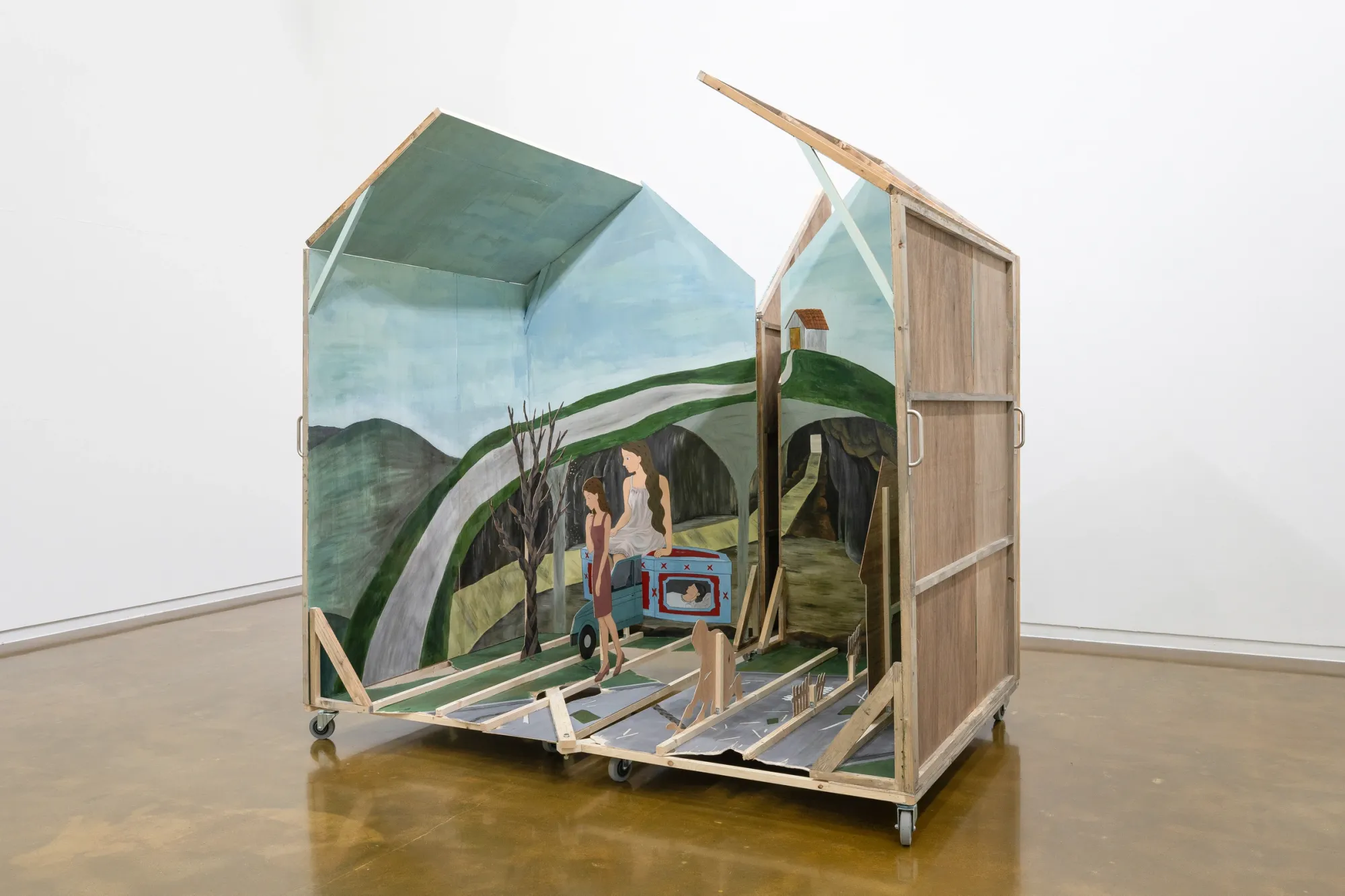 Seongeun Lee, Cheongju Art Studio, Cheongju: two halves of a house apart, plywood back panel at right, painted road and a blue car inside.