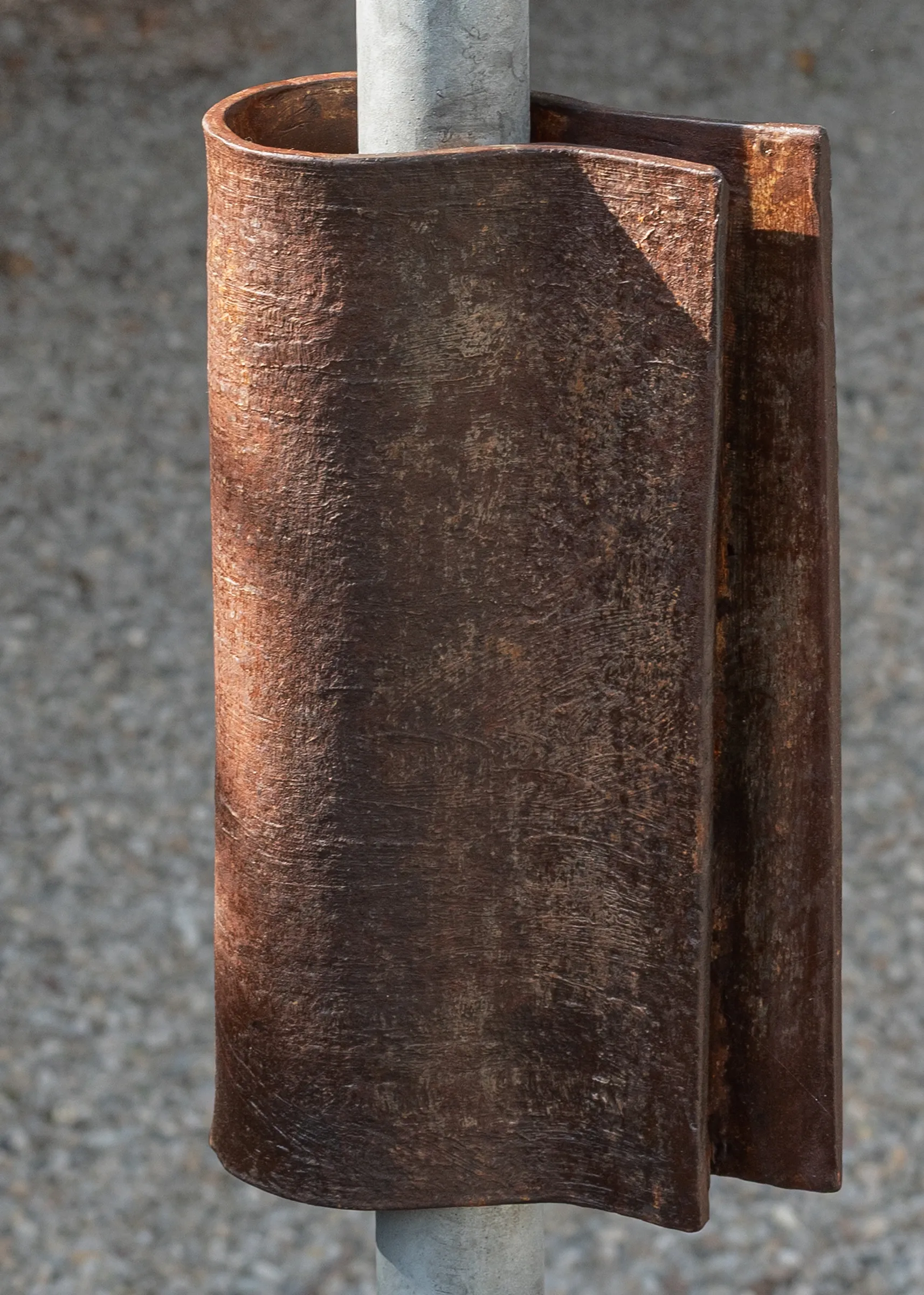 Exhibition review of Simon Bultynck: A. Aubry, A. Colin, P. Lippens, A. Oosterlinck, C. Wynants at CONVENT Space for Contemporary Art, Ghent, 2026. Close-up of a rust-brown folded cylindrical form