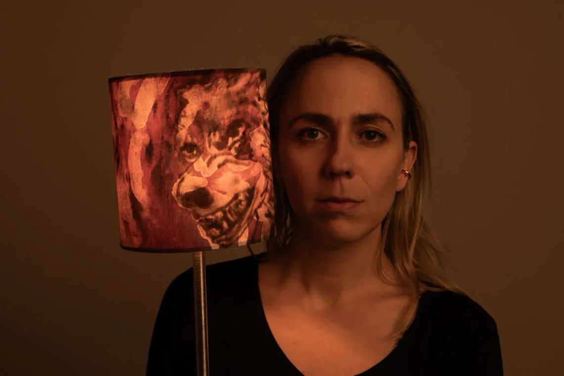 olga pastekova with my furry fiery friend, irrlichter luminous lamp, artist portrait