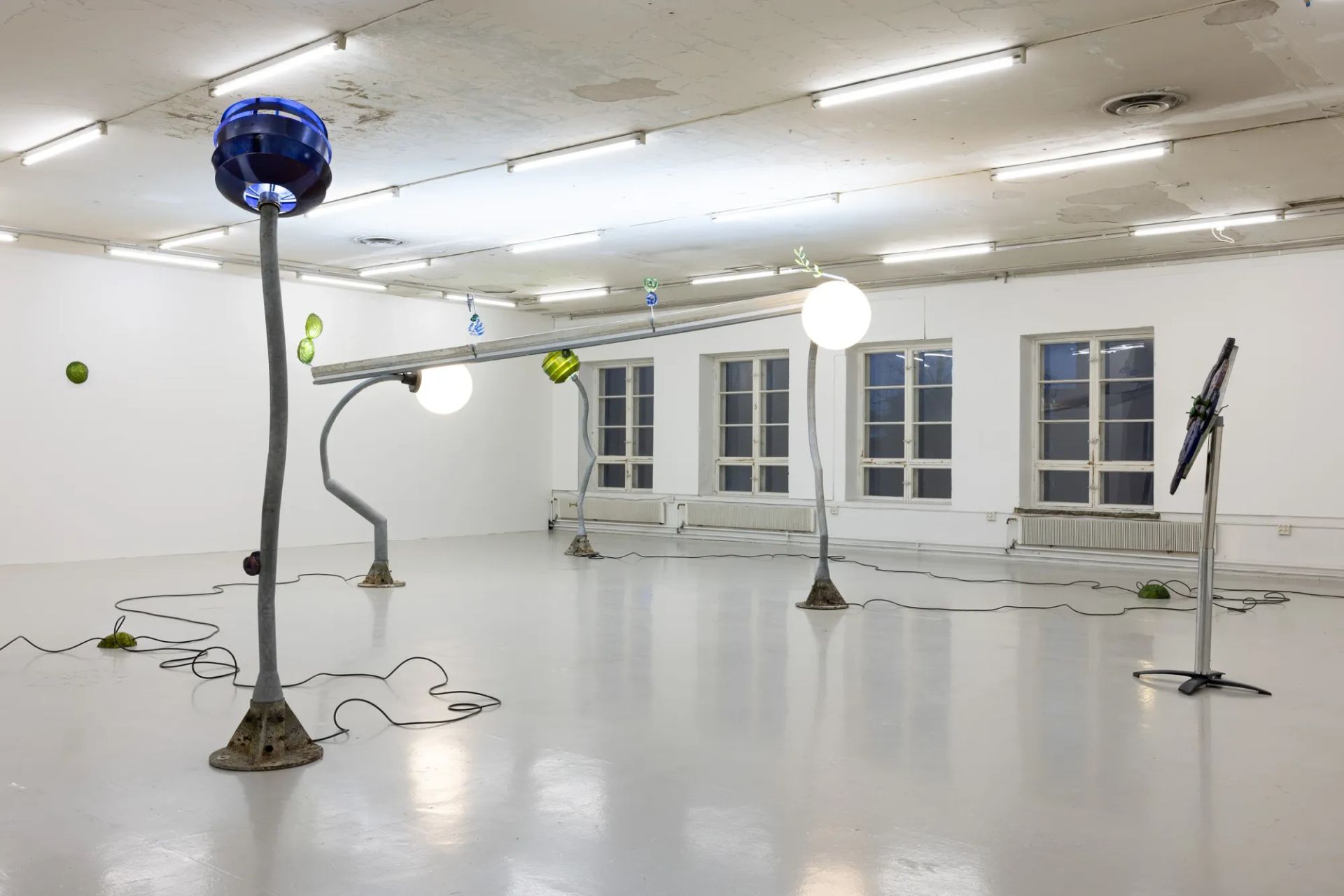 Installation view of "Worker Ant After Work" (2026) by Matti Sumari at SIC Helsinki, featuring sculptural street light forms