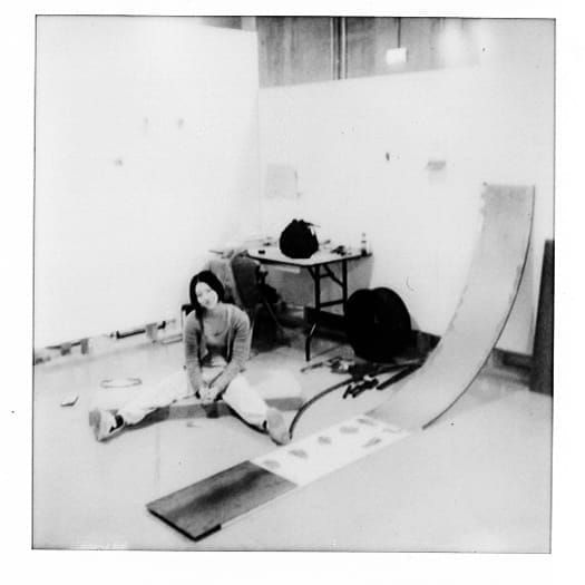 Shirley Fu installation view in studio London hybrid sculpture with curved metal sheet found tyre and tools on floor photo by Runqi Wen