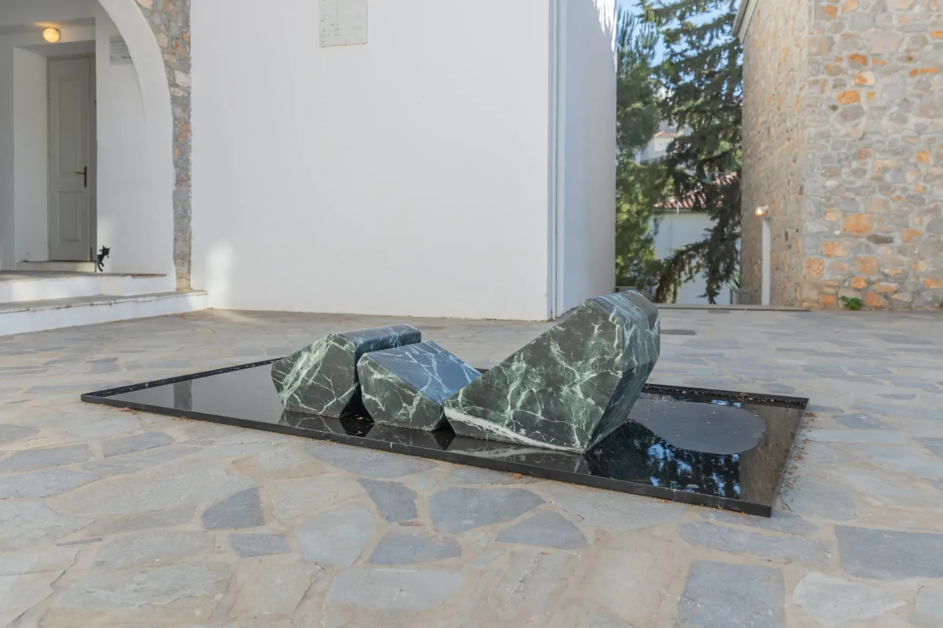 Exhibition review of Dimitrios Antonitsis, close-up detail showing green marble form - catapult contemporary