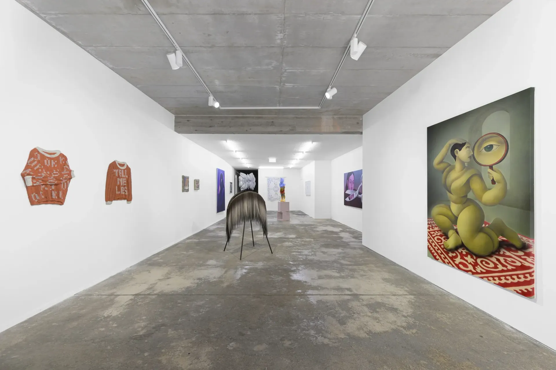 Exhibition review of Soft Power: gallery corridor installation view with paintings and sculpture, Umrian Gallery, Bratislava, 2026.