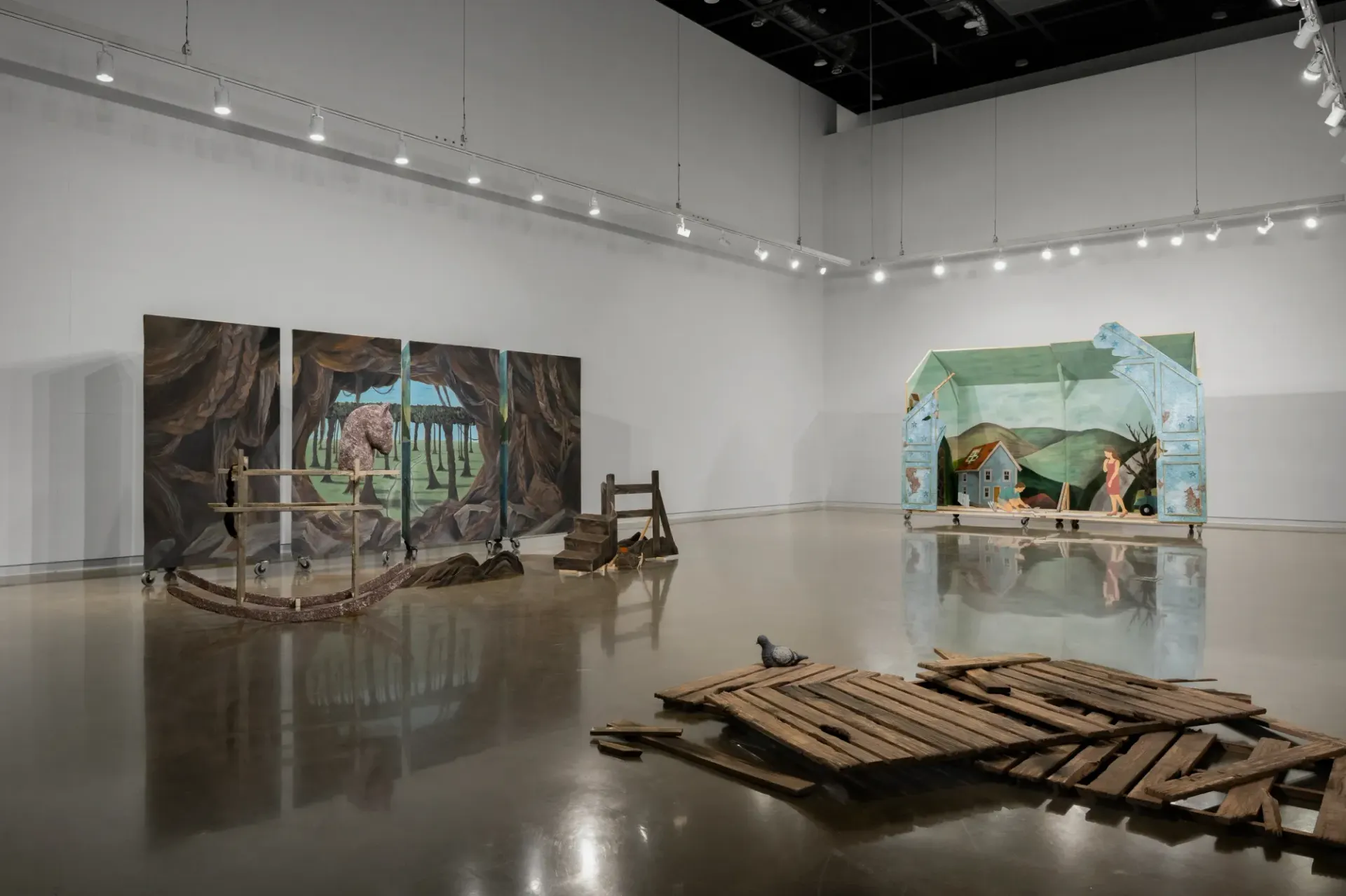 ALT: Seongeun Lee, Cheongju Art Studio, Cheongju: painted panels and a house on casters in a white hall.
