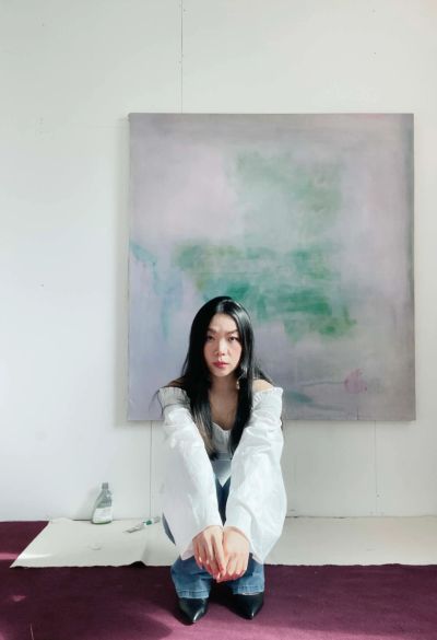 Jie Zhang portrait of the artist infant of one of her artworks