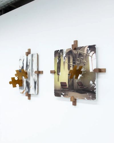 Vivienne Sun Liminality installation detail showing photographic works mounted on wooden puzzle-like brackets referencing institutional interiors