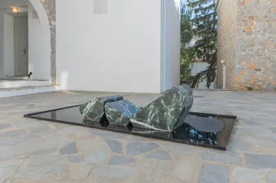 Exhibition review of Dimitrios Antonitsis, close-up detail showing green marble form - catapult contemporary