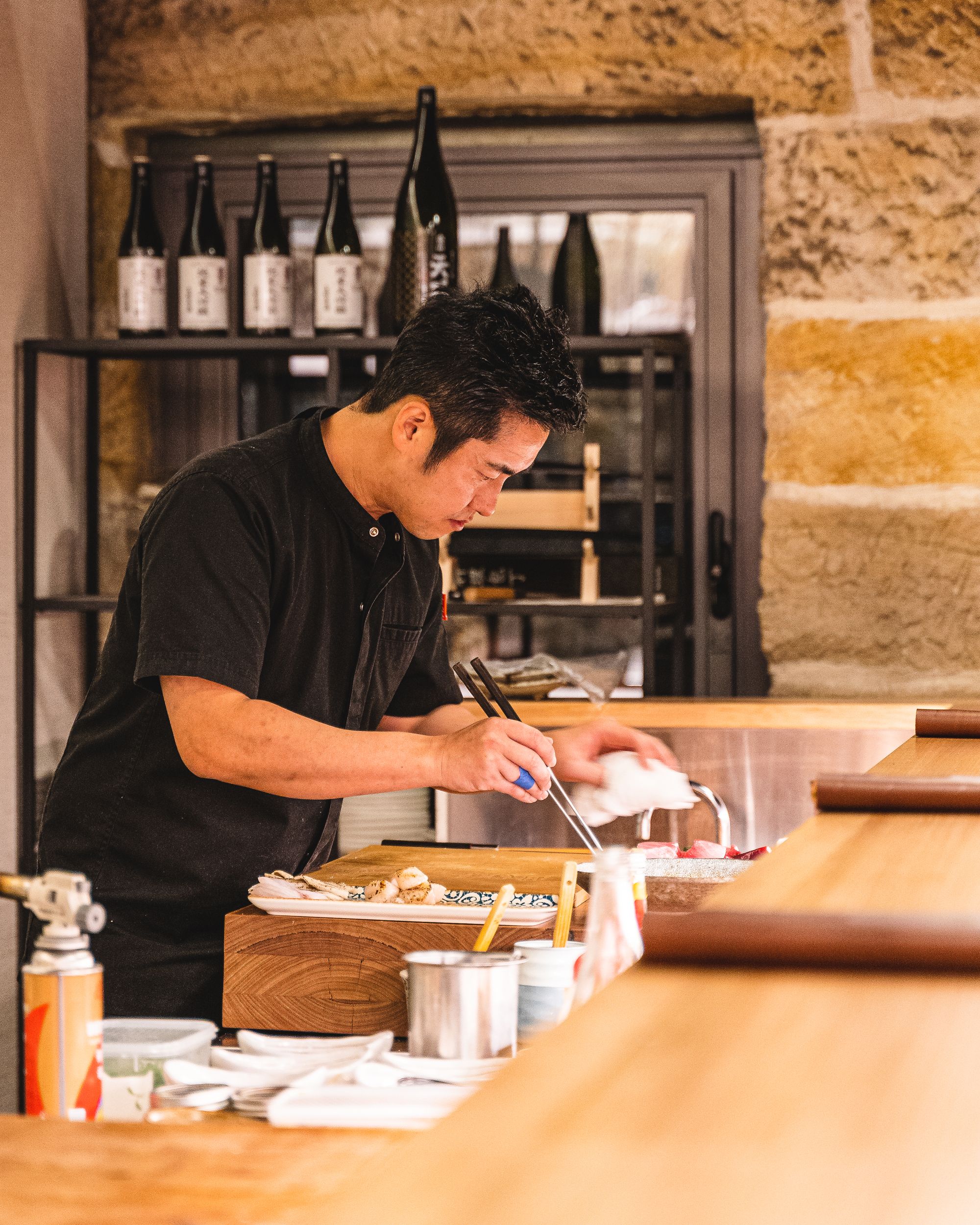 Asian chef preparing food