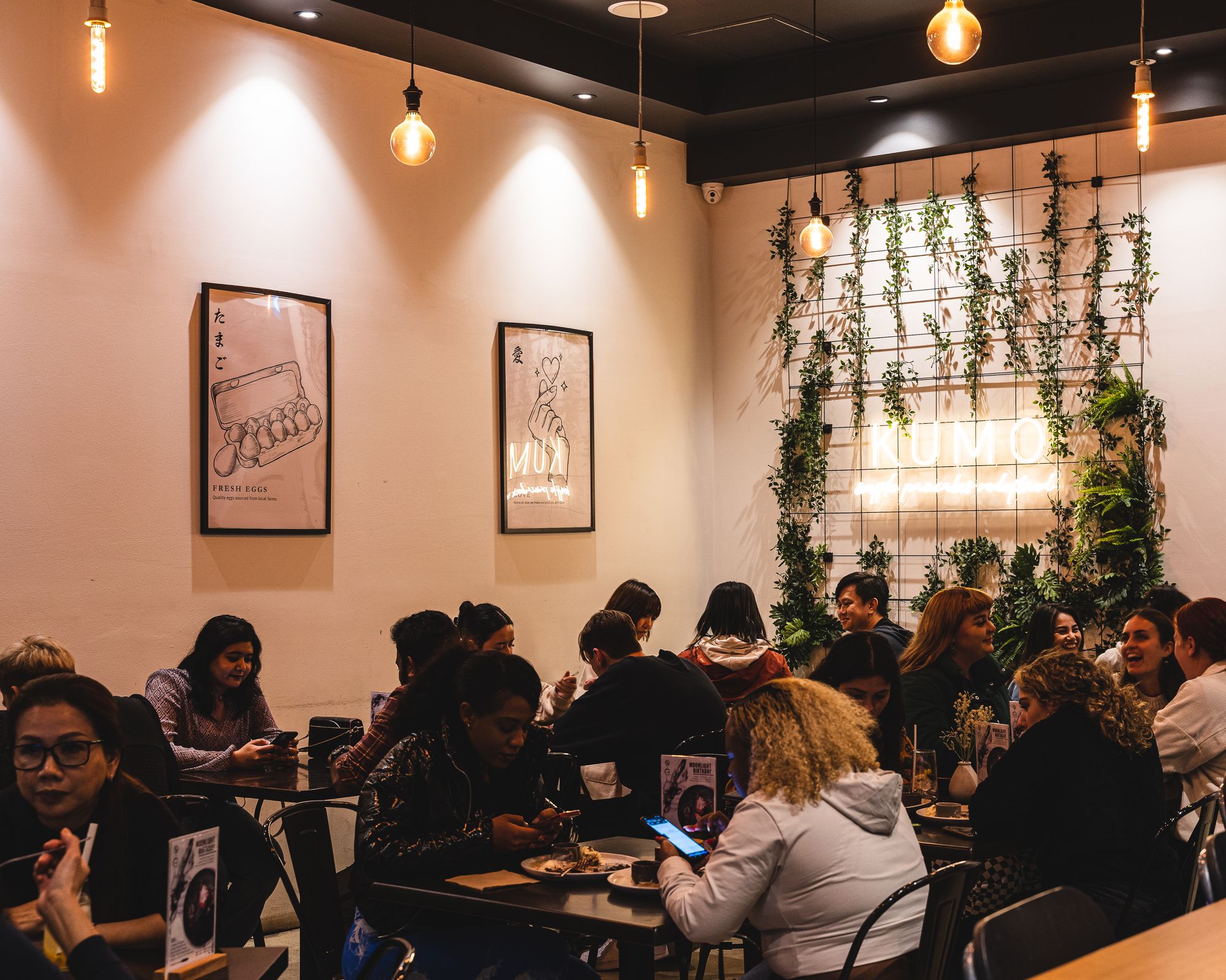 Interior of Kumo showing lots of guests dining