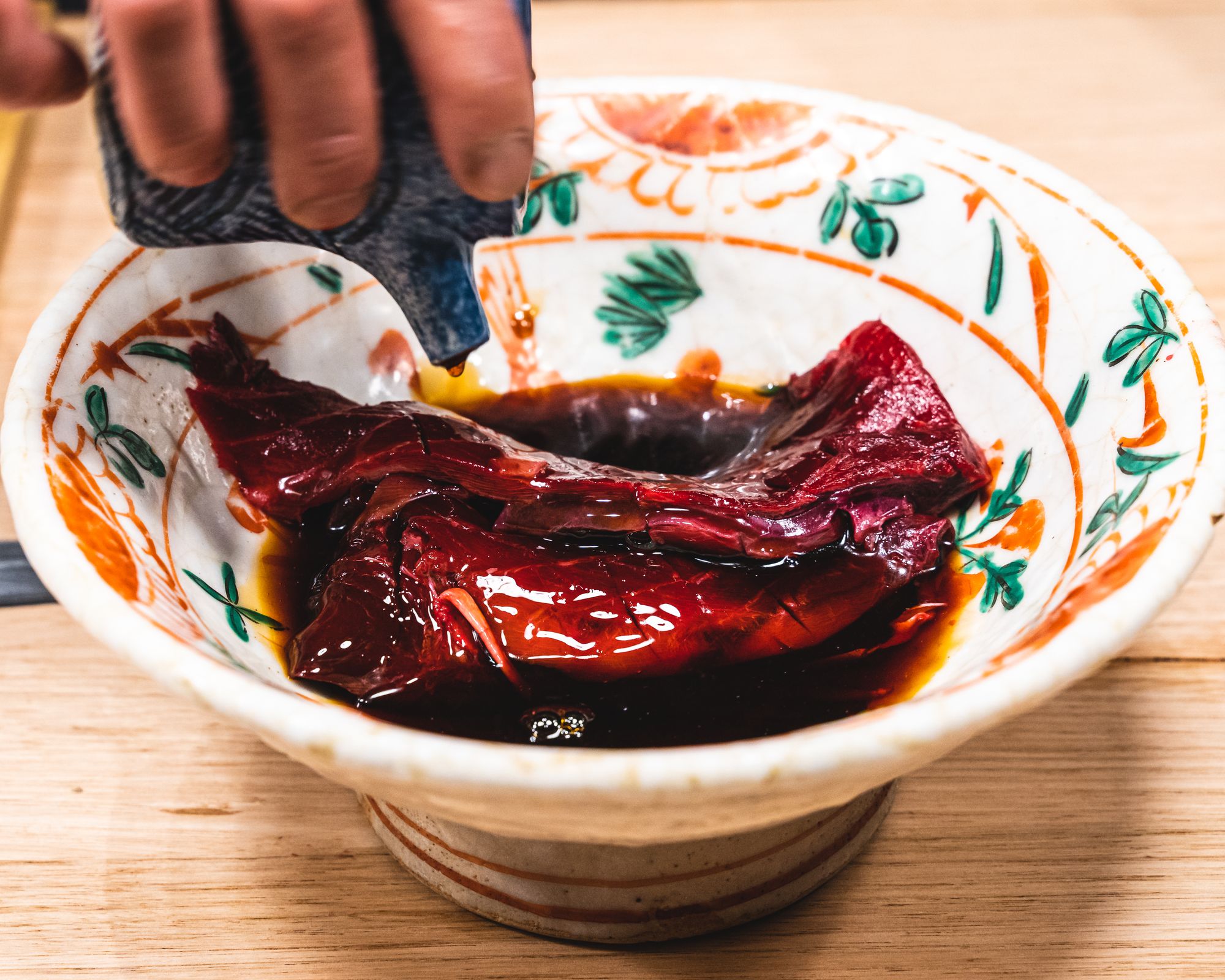 Marinating tuna bloodline in soysauce