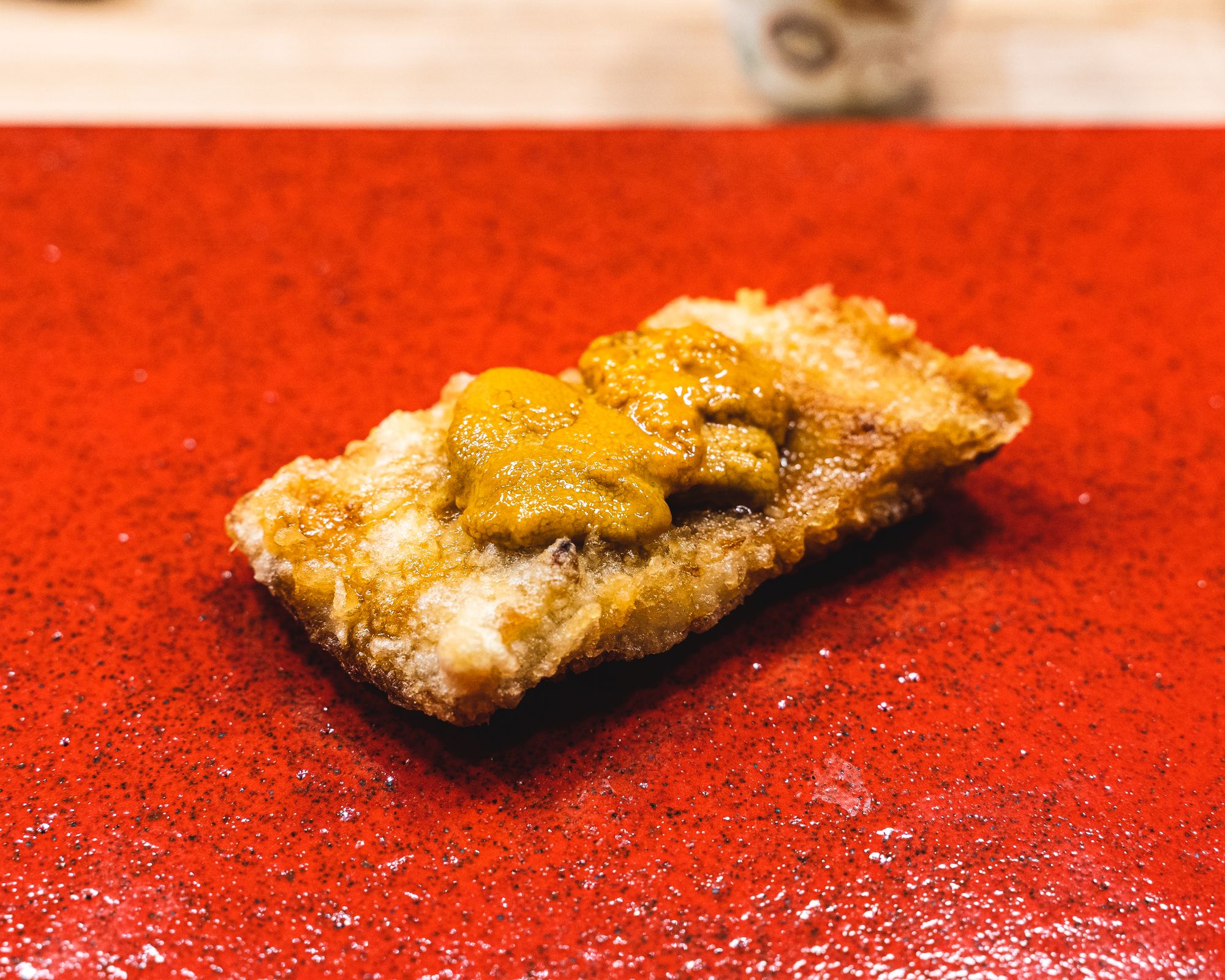 Close up of tempura eel with uni