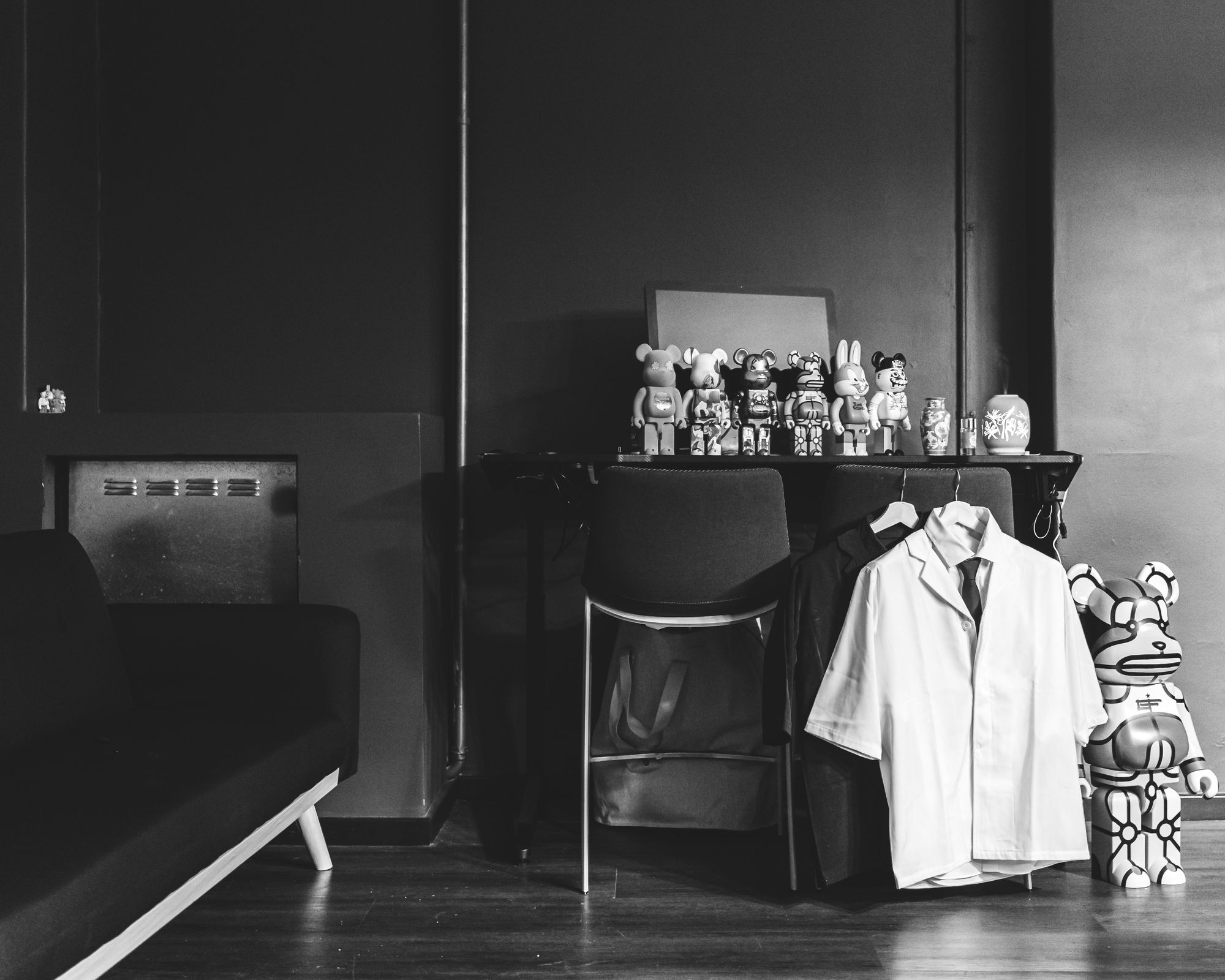 Table with Bearbricks placed on-top