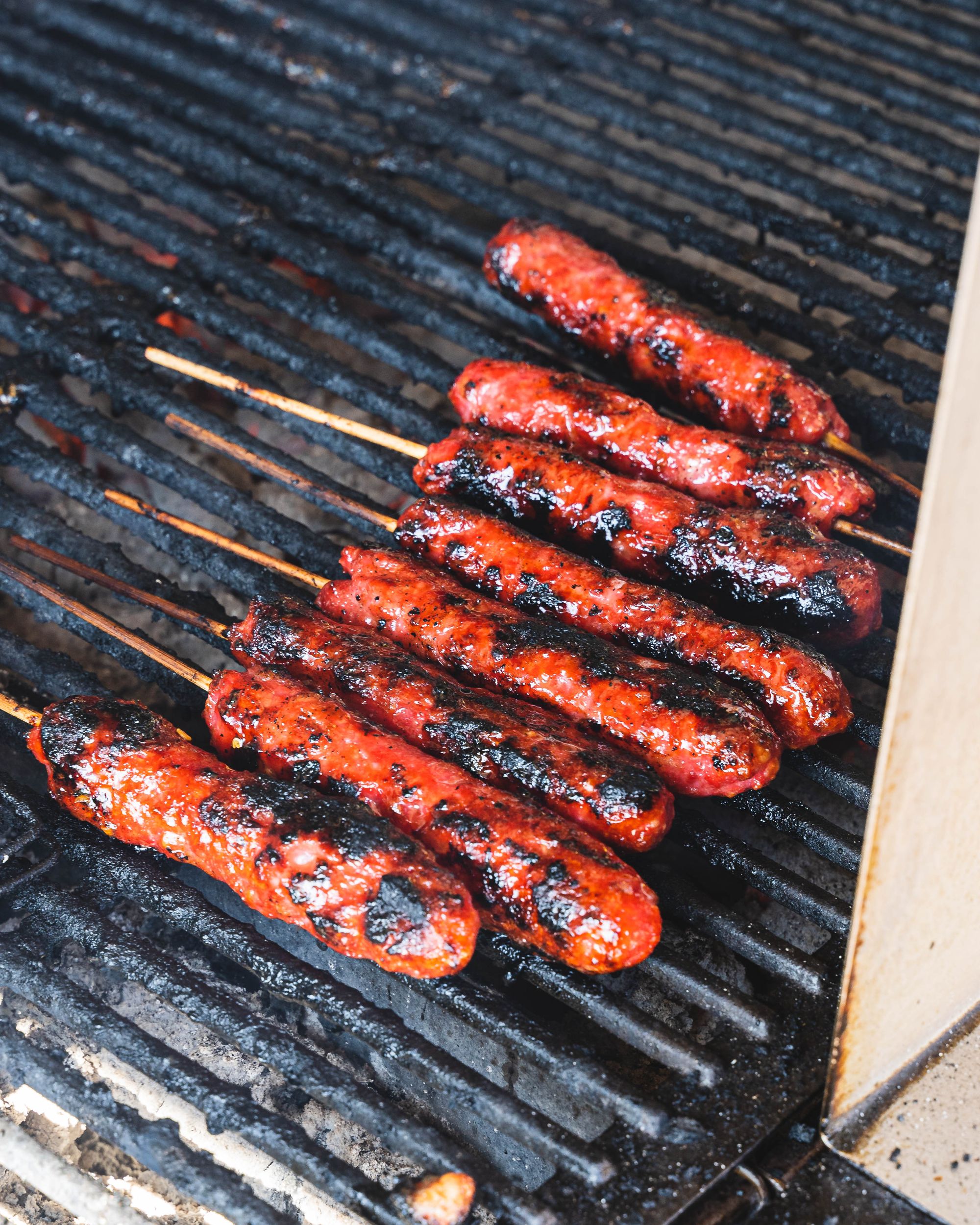 Vietnamese pork mince skewers grilling