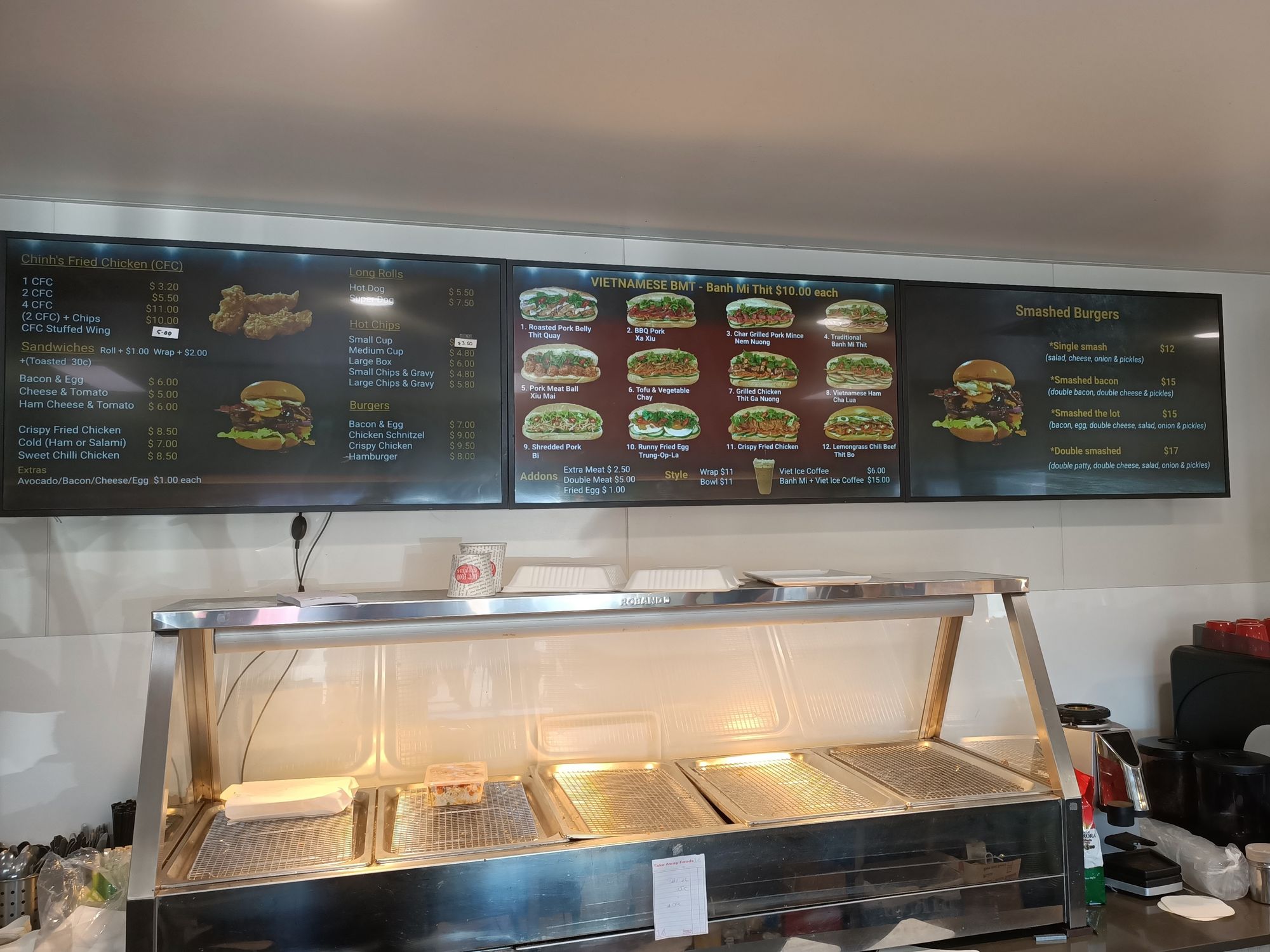 Bibra Lake Lunch Bar's menu shown on TV screens