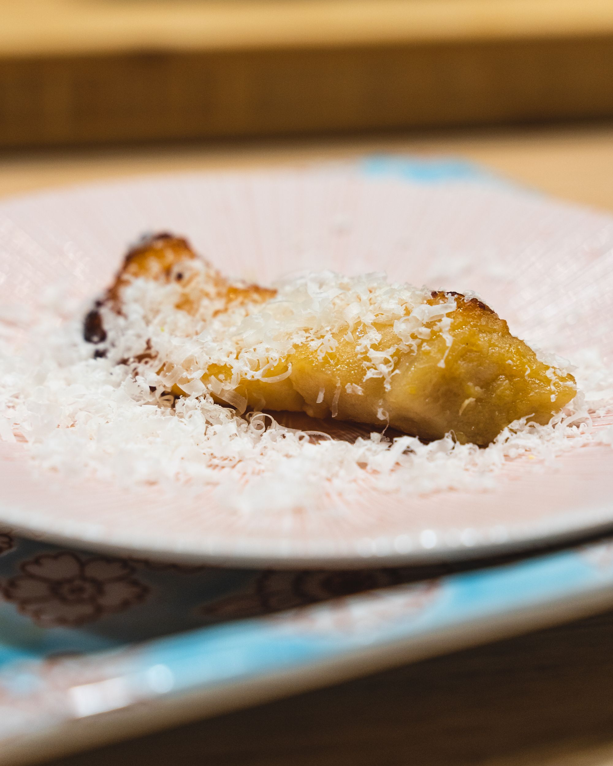 Cod with shaved cheese