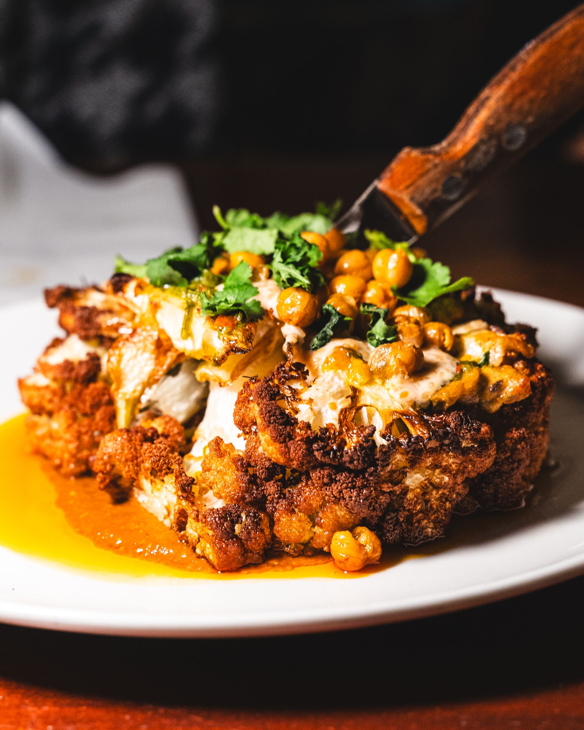 Close up of roasted cauliflower with fried chickpeas