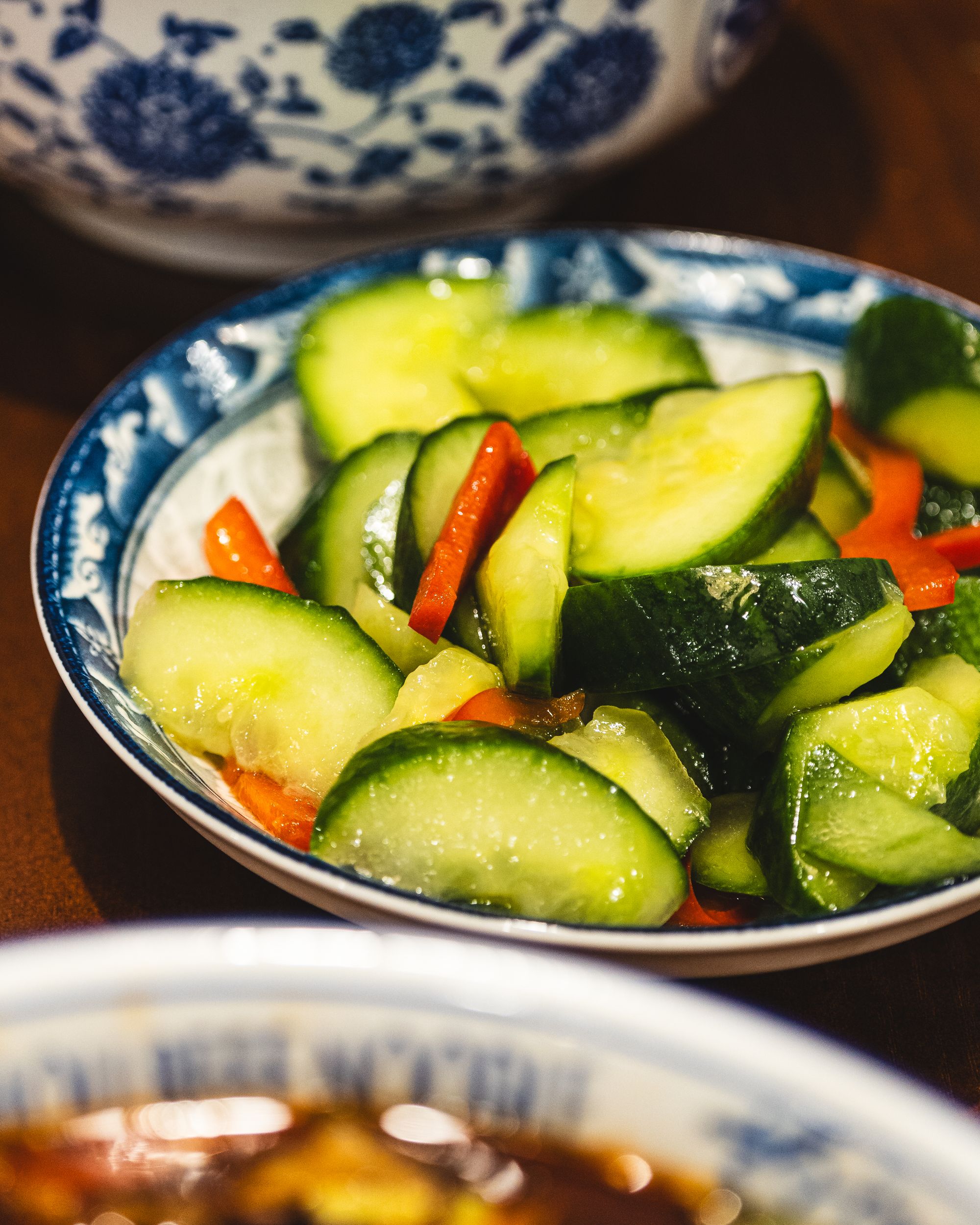 Closeup of cucumber and red capsicum slices