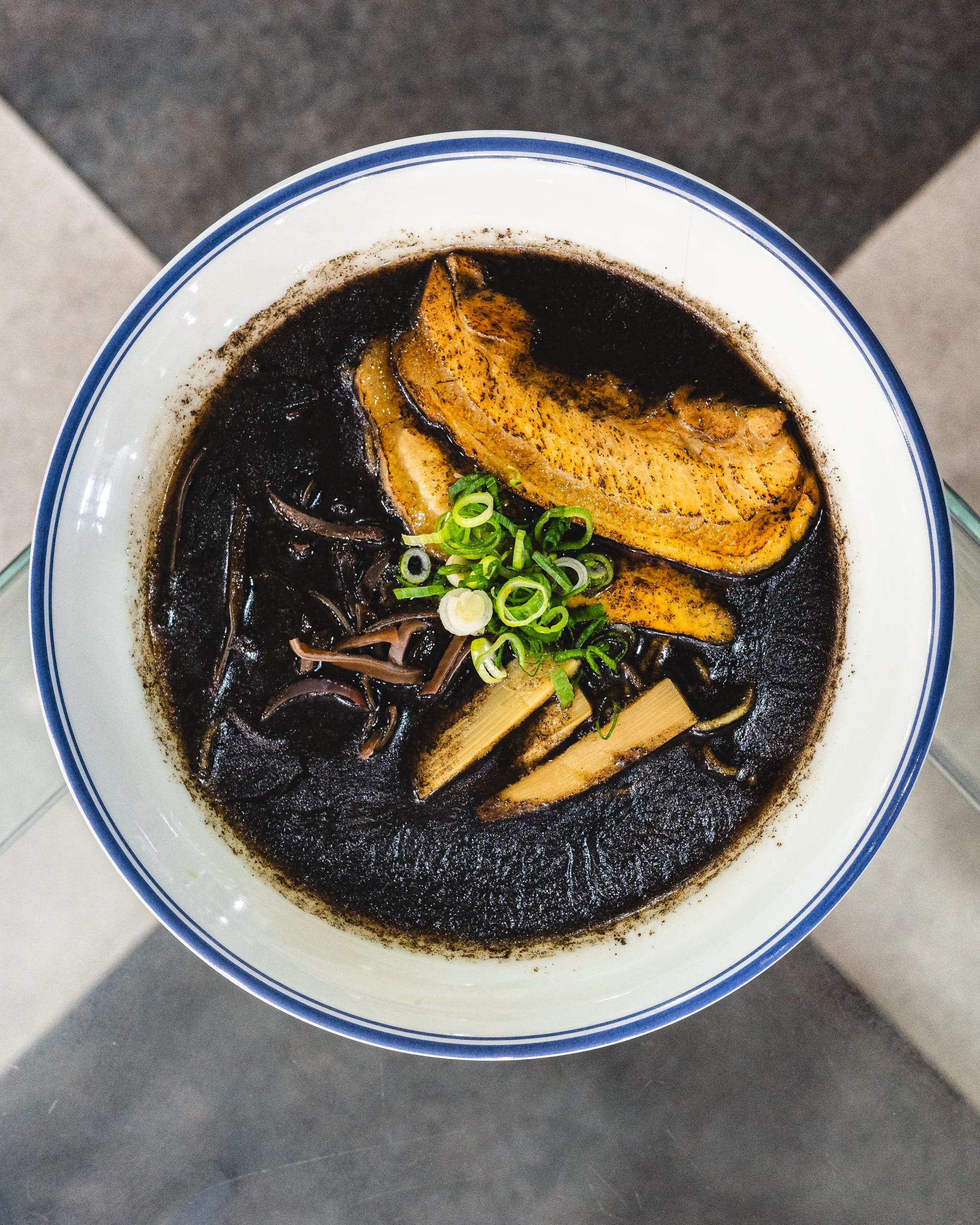 Top down shot of black garlic ramen