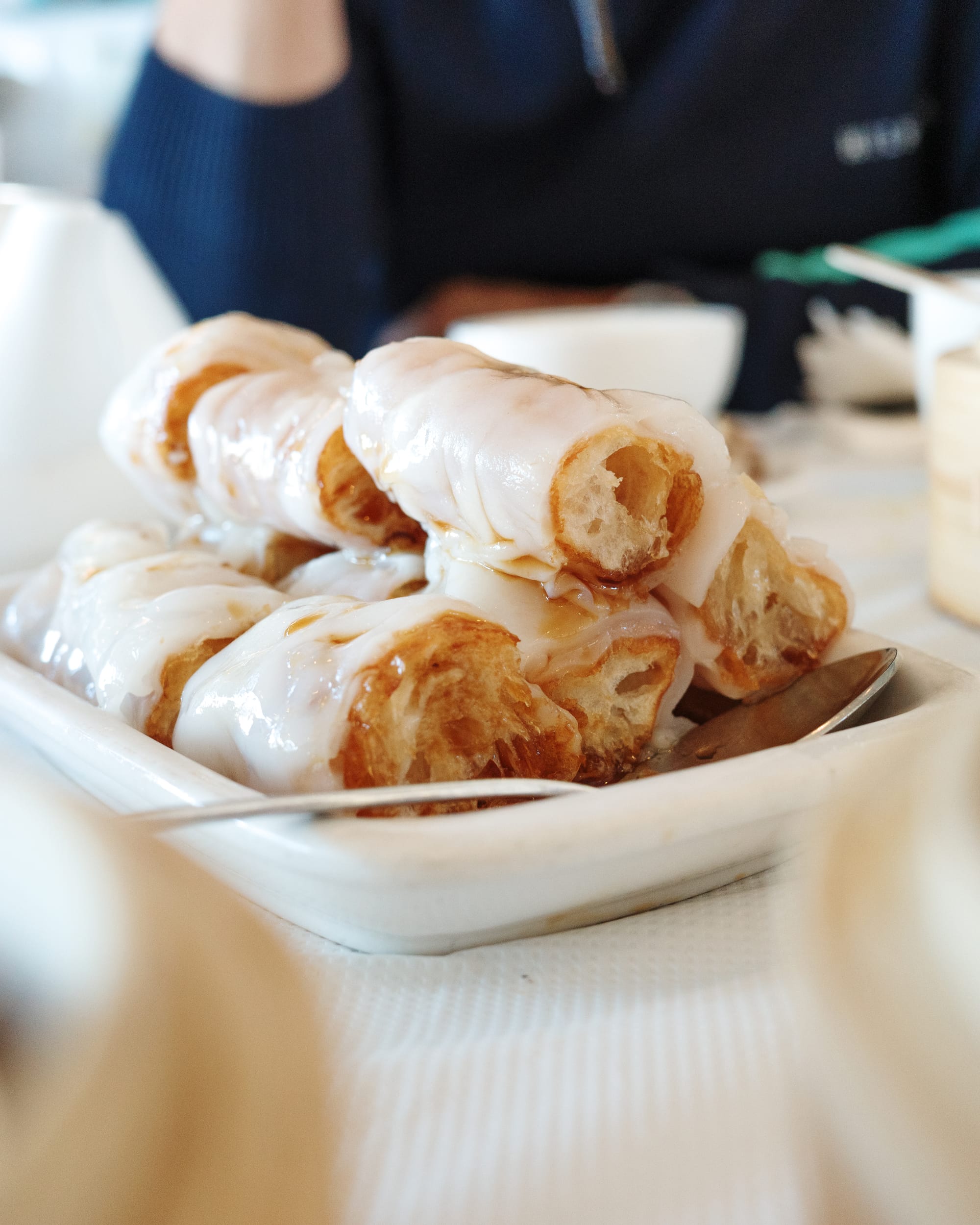 Close up of fried dough rice noodle roll