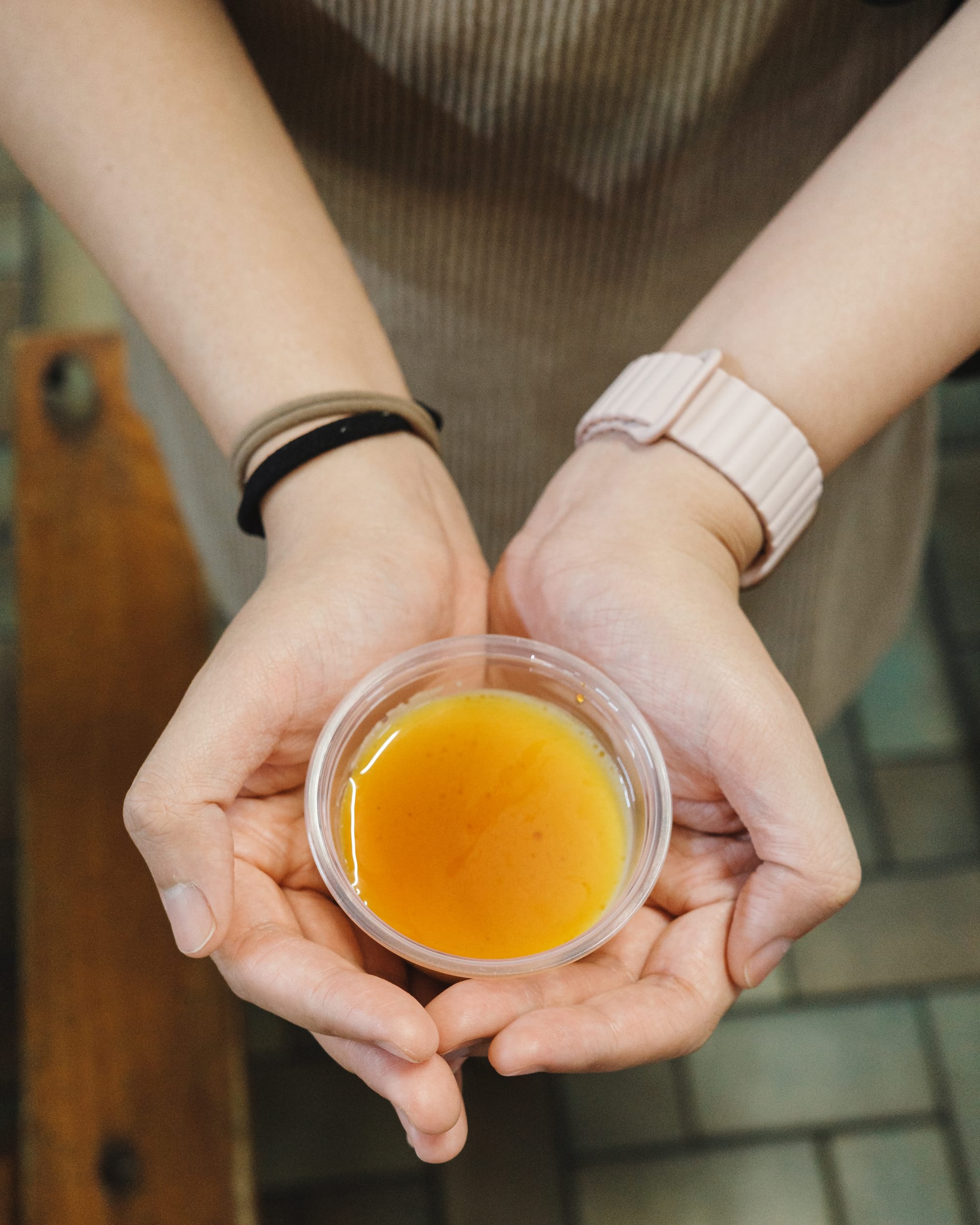 Hand holding Japanese purin