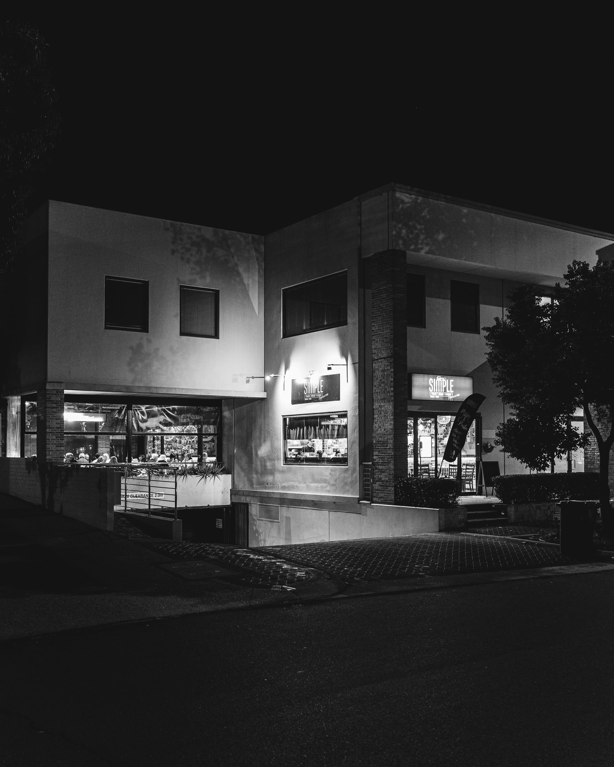 Black and white photo of restaurant exterior