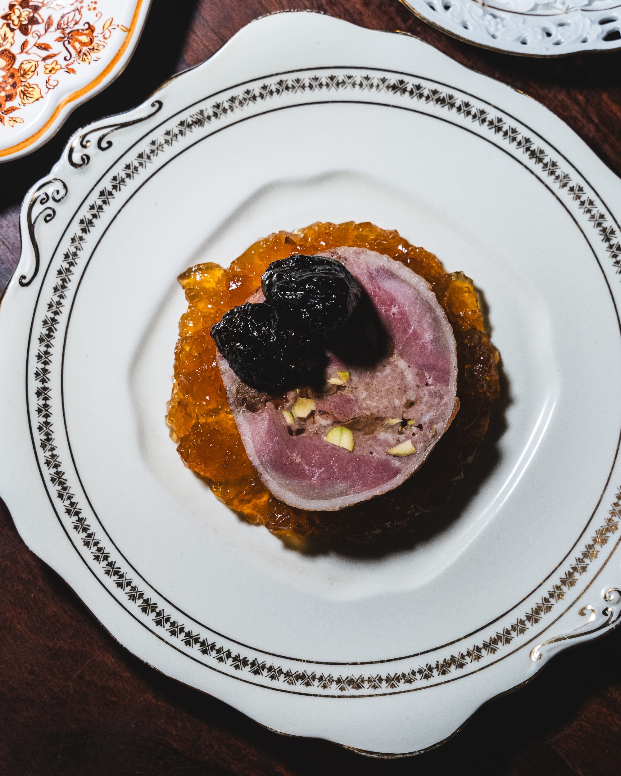 Top down shot of terrine with jelly and jam on top