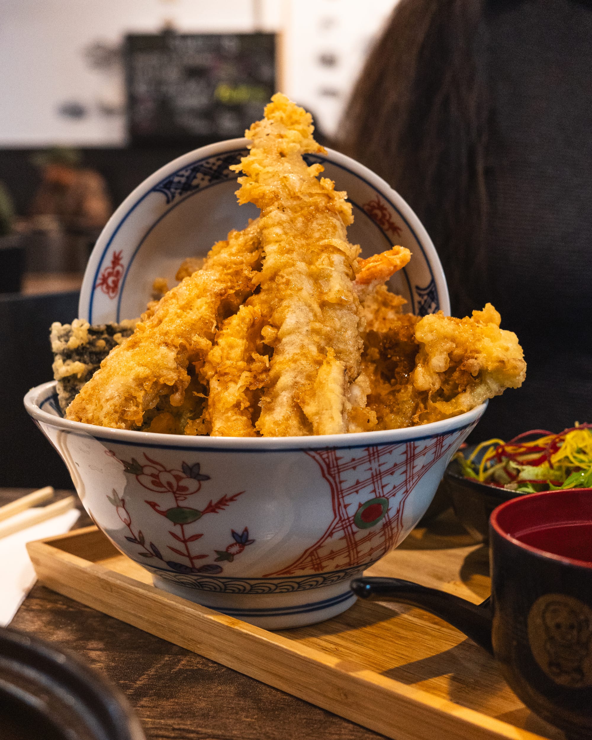 Close up shot of tempura in a bowl piled up