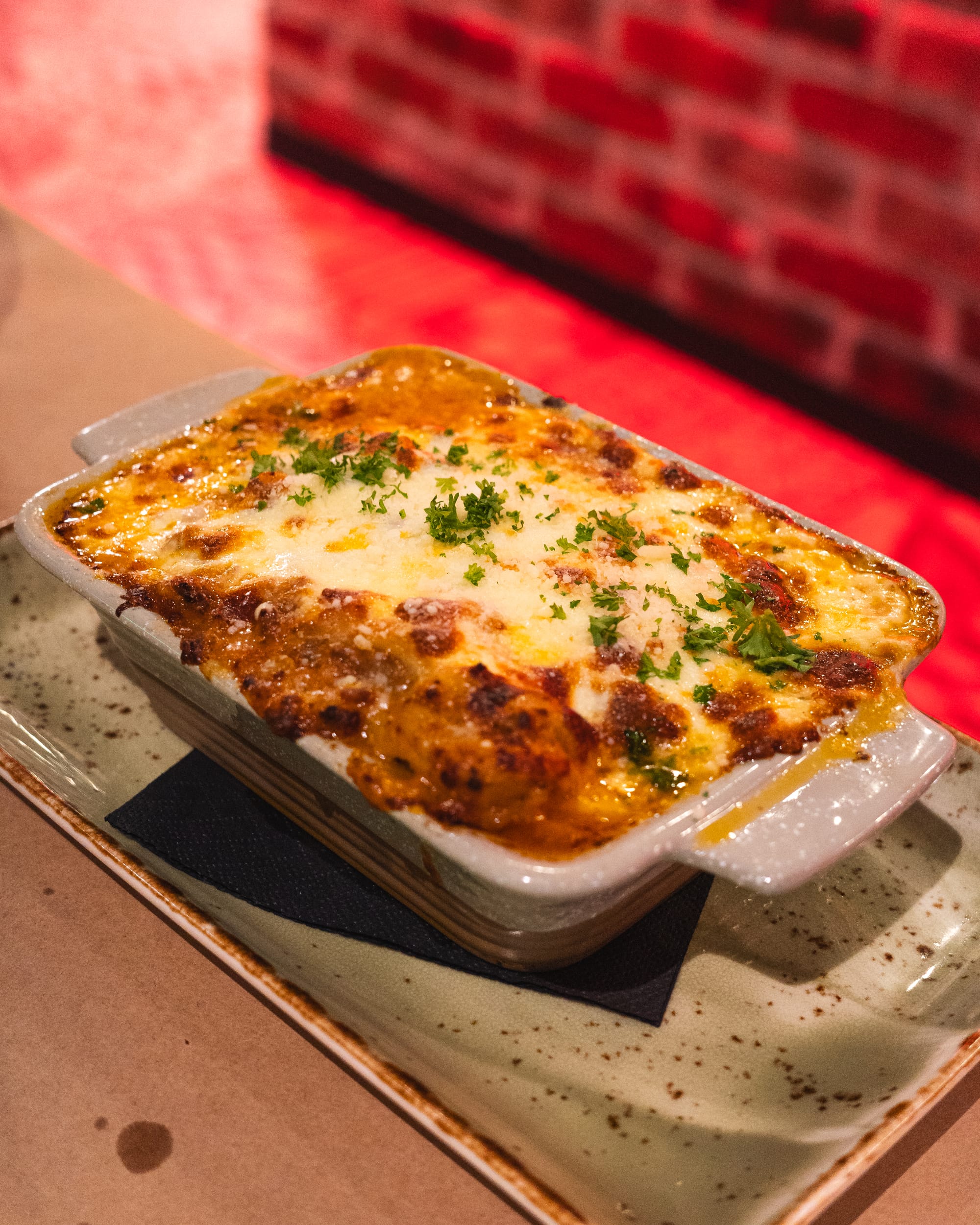 Close up shot of beef lasagne with cheese