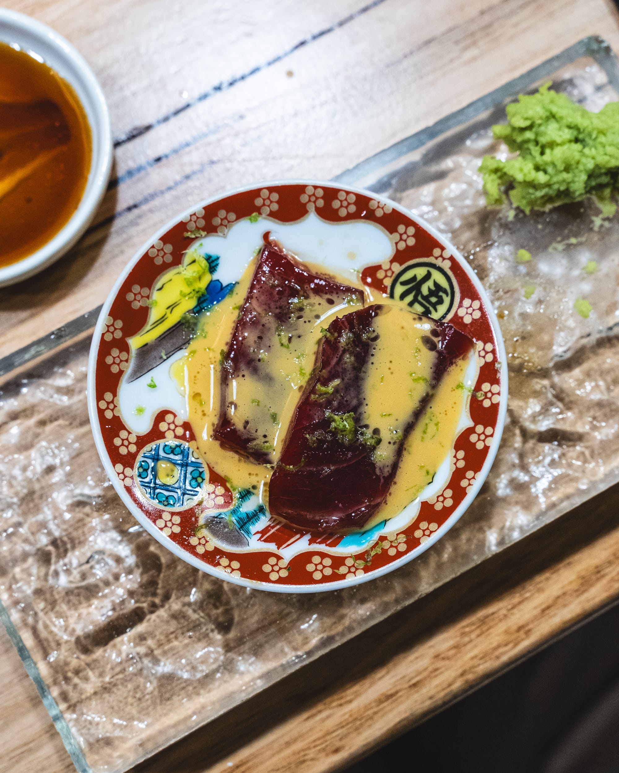 Top down shot of tuna with uni sauce