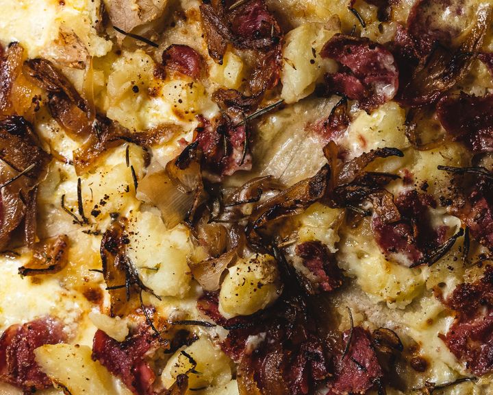 Extreme close up of pizza, showing zoomed in ingredients