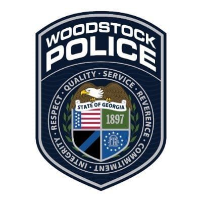 Woodstock public safety heroes shop with nearly 100 children
