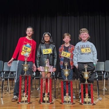 E.T. Booth Student Wins County Spelling Bee; Four Advance