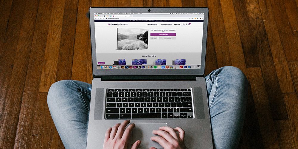 woman on laptop ordering black and white canvas from Canvas On Demand
