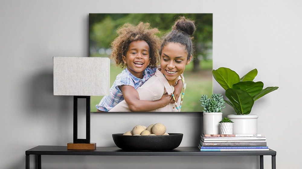 16x20 Canvas Print of a mother and child over a table in a modern entryway.