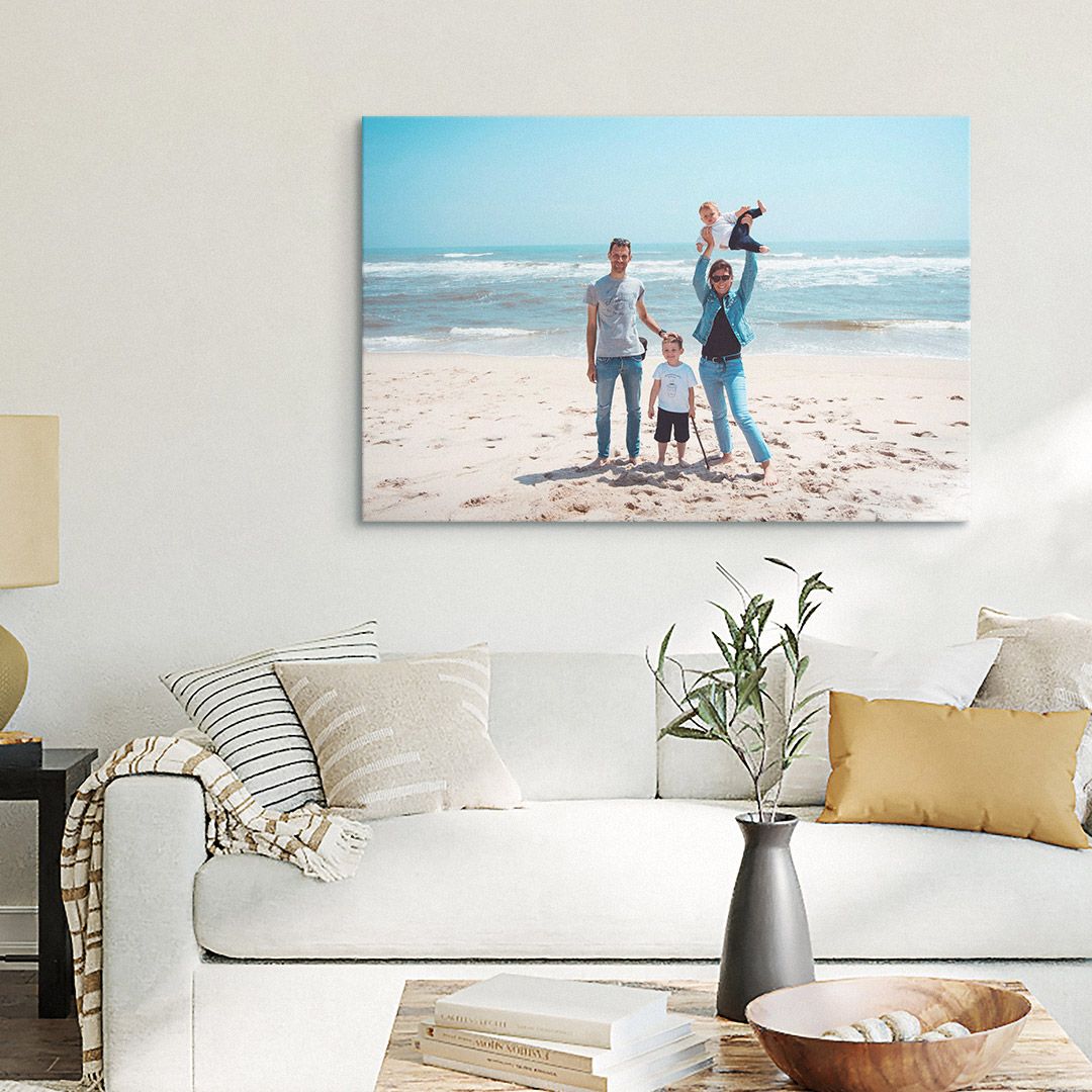 an airy living room interior with a large canvas print on the wall