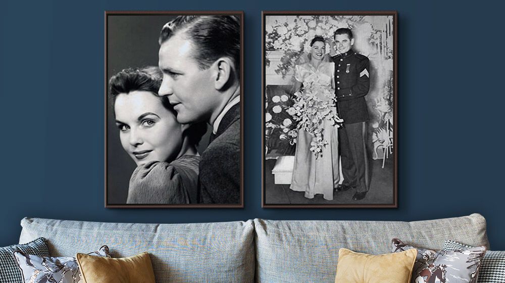 two walnut floating framed canvases with vintage wedding photos above couch