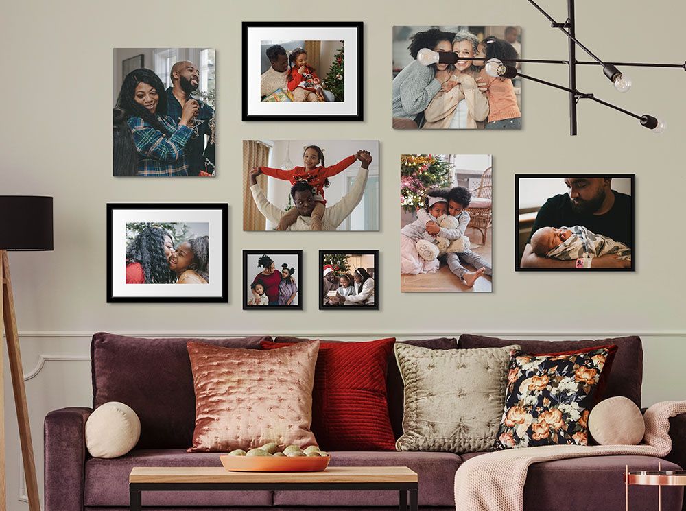 A variety of framed canvases, canvas prints, and framed prints in a range of sizes